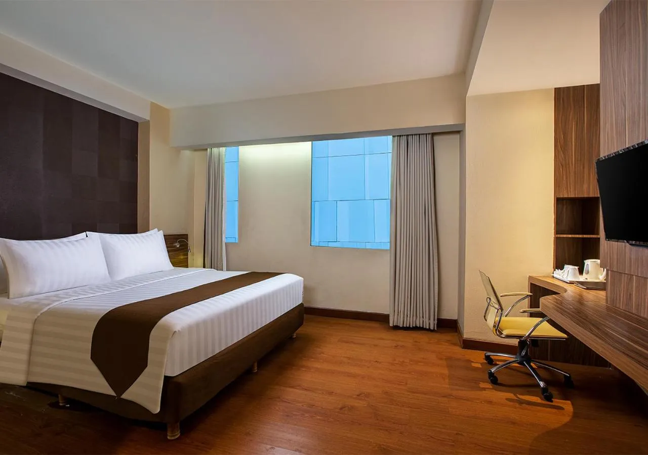 Bed in PRIME PARK Hotel & Convention Pekanbaru