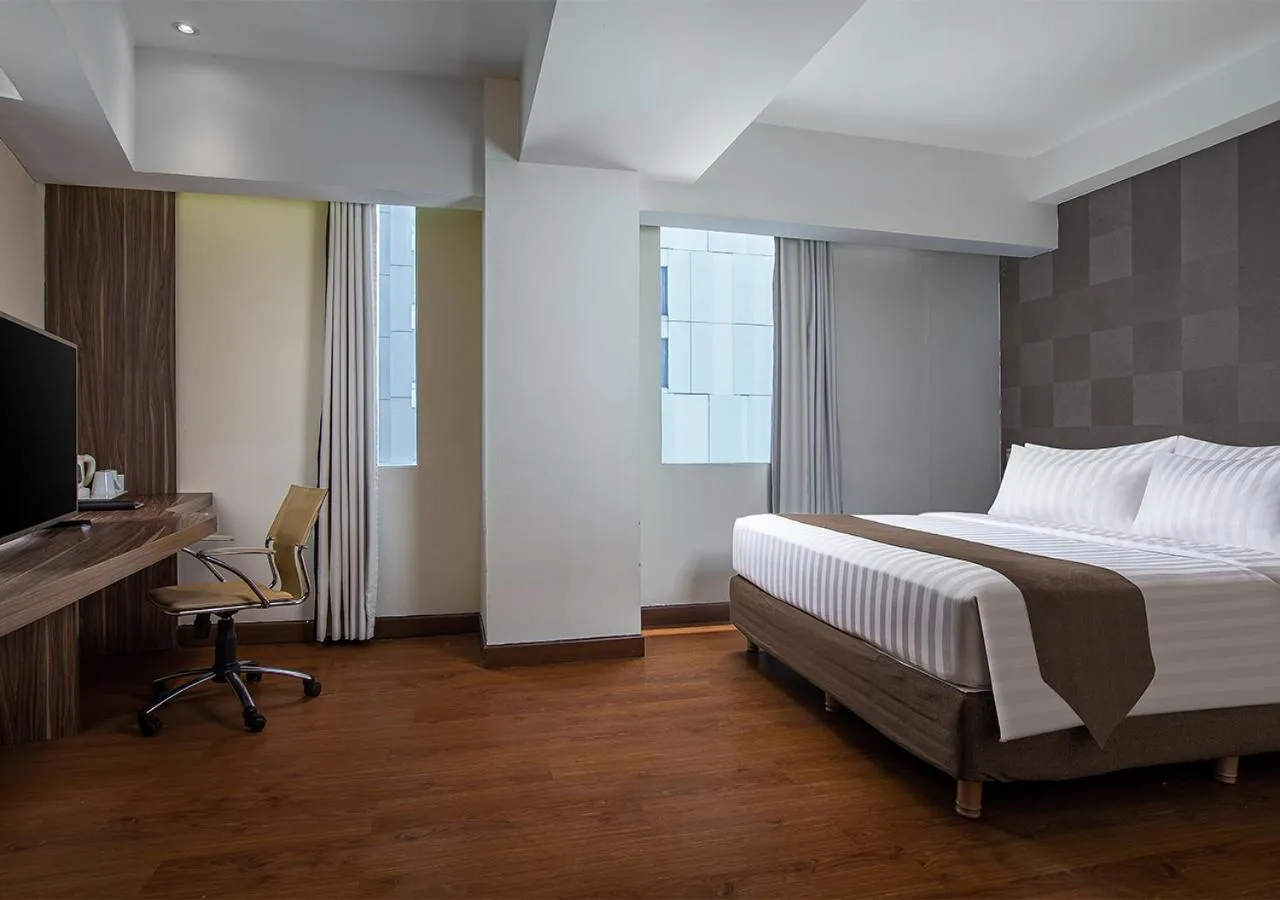 Bed in PRIME PARK Hotel & Convention Pekanbaru