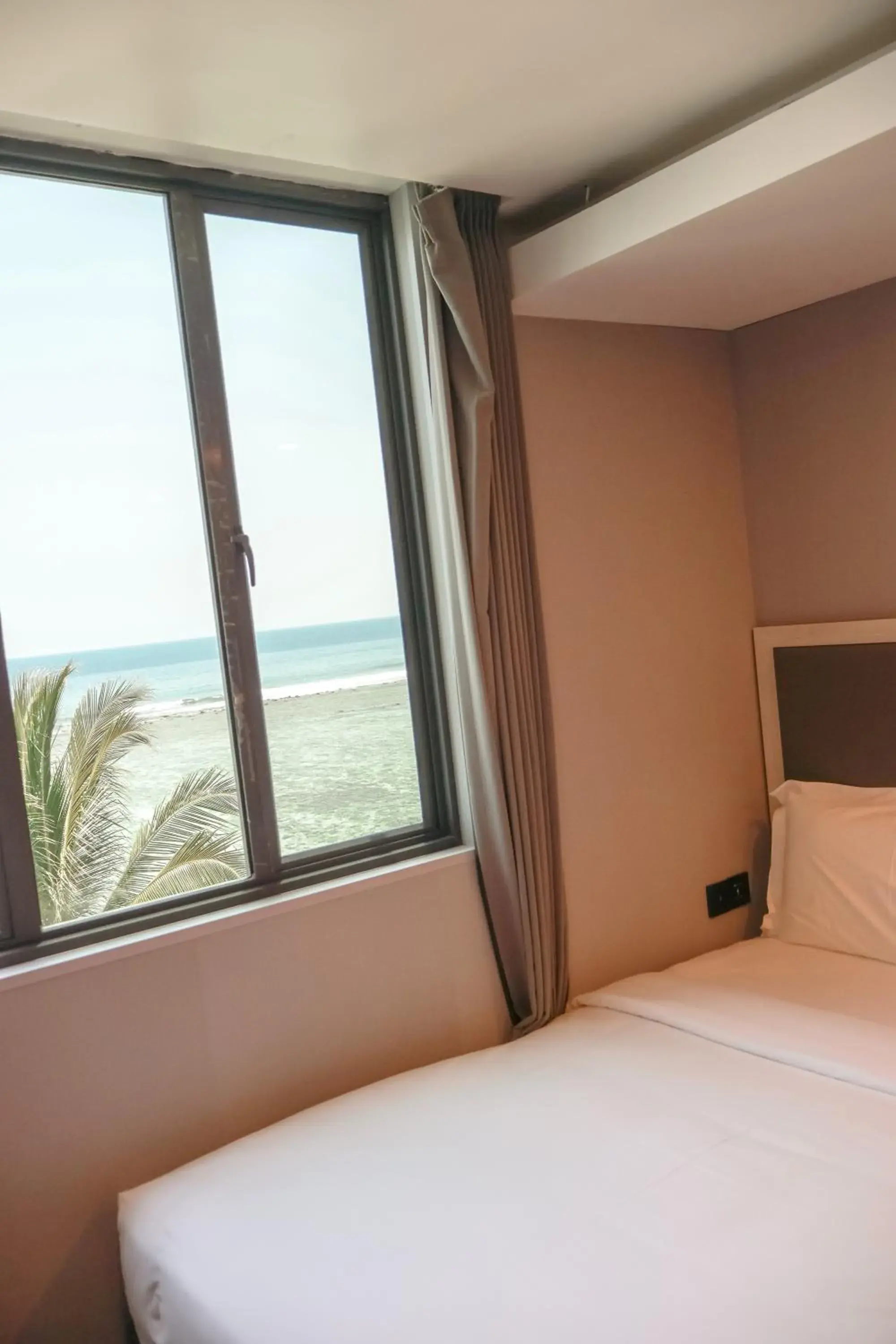 View (from property/room), Bed in Starry Beach Inn View (from property/room), Bed in Starry Beach Inn