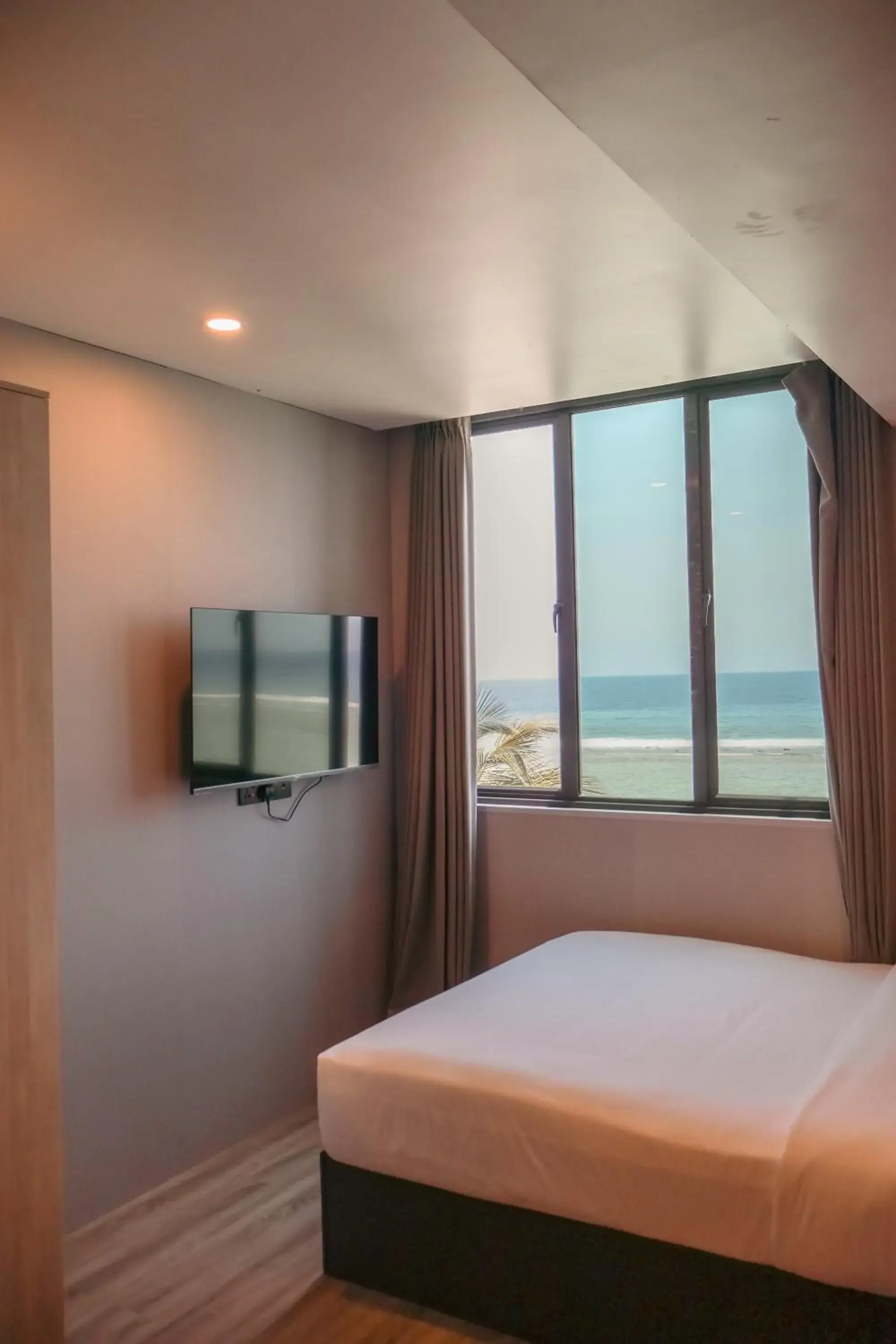 View (from property/room), Bed in Starry Beach Inn View (from property/room), Bed in Starry Beach Inn