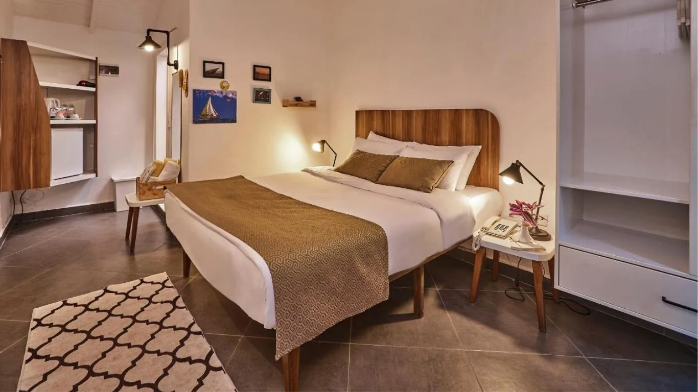 Bed in Maya Bistro Hotel & Beach