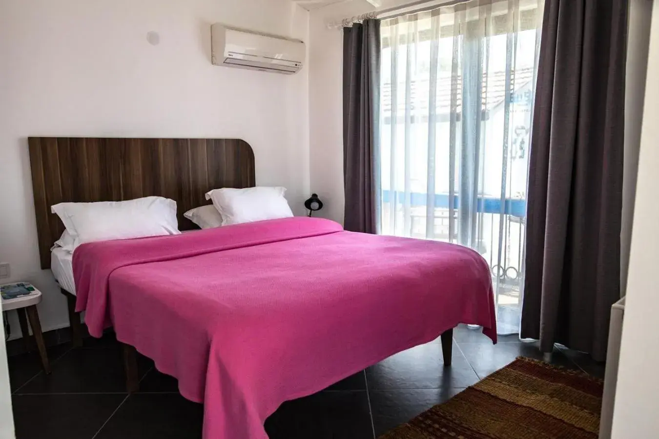 Bed in Maya Bistro Hotel & Beach