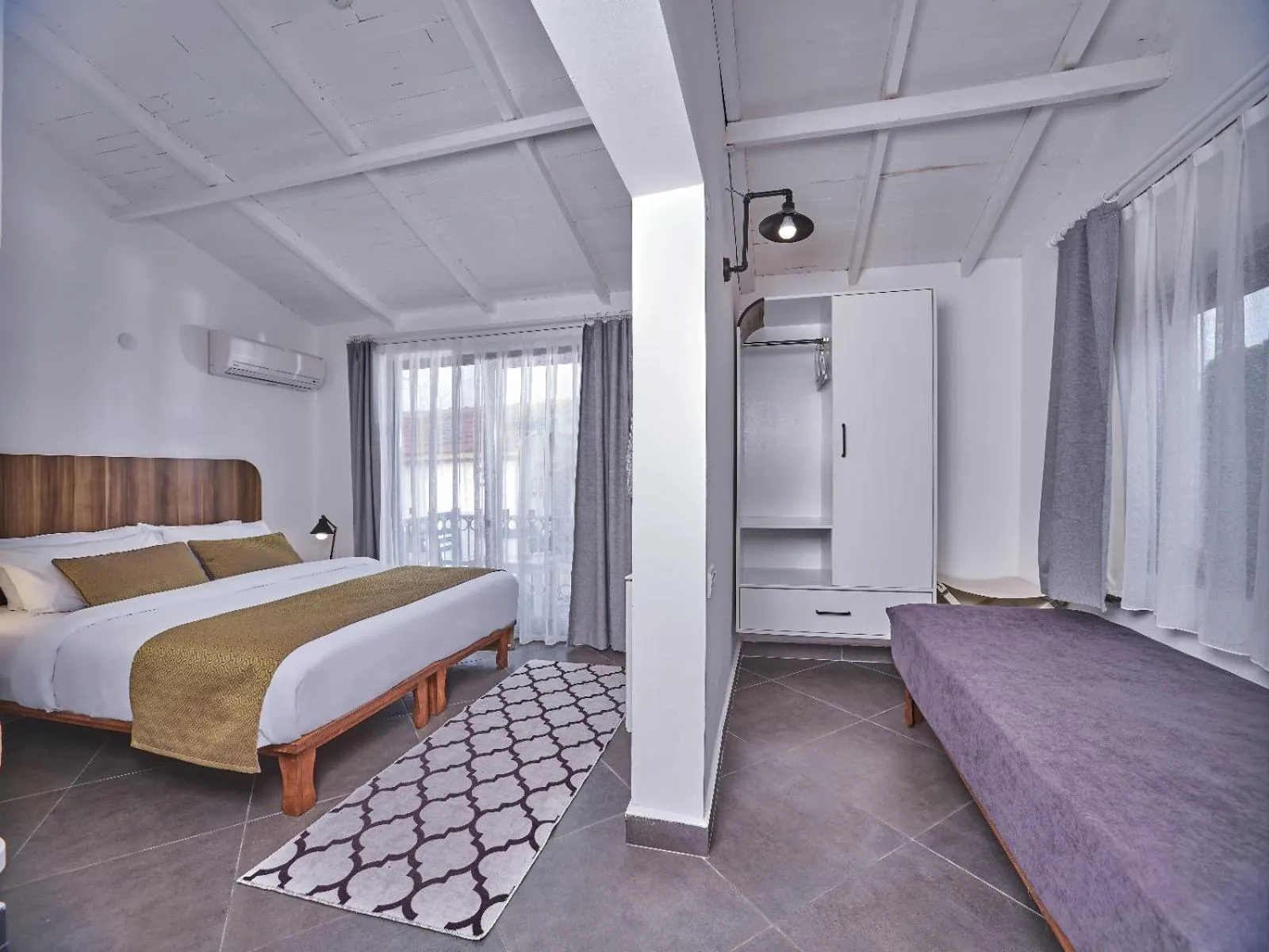 Bed in Maya Bistro Hotel & Beach