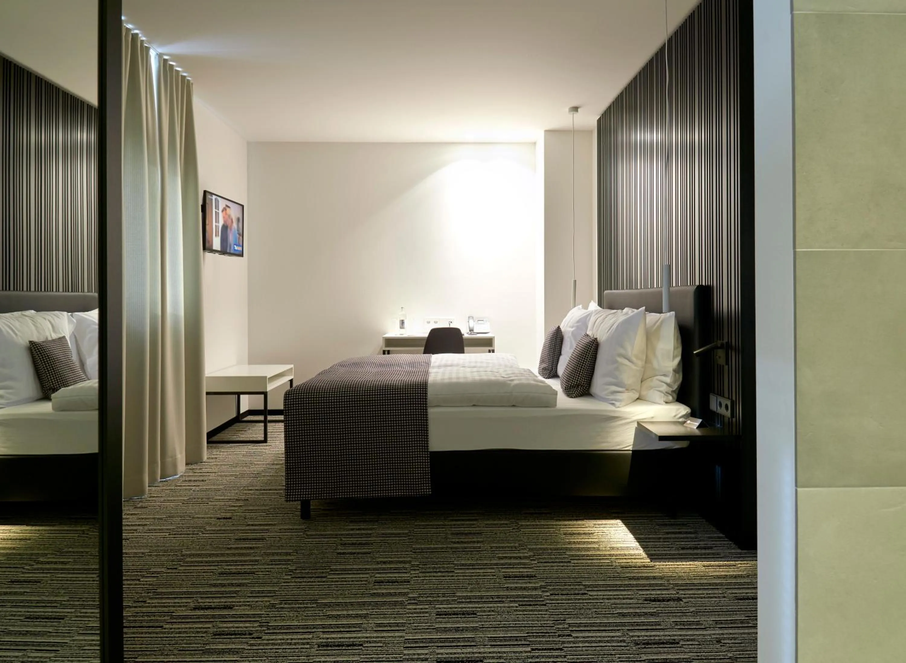 Seating area, Bed in Hostellerie Stafelter