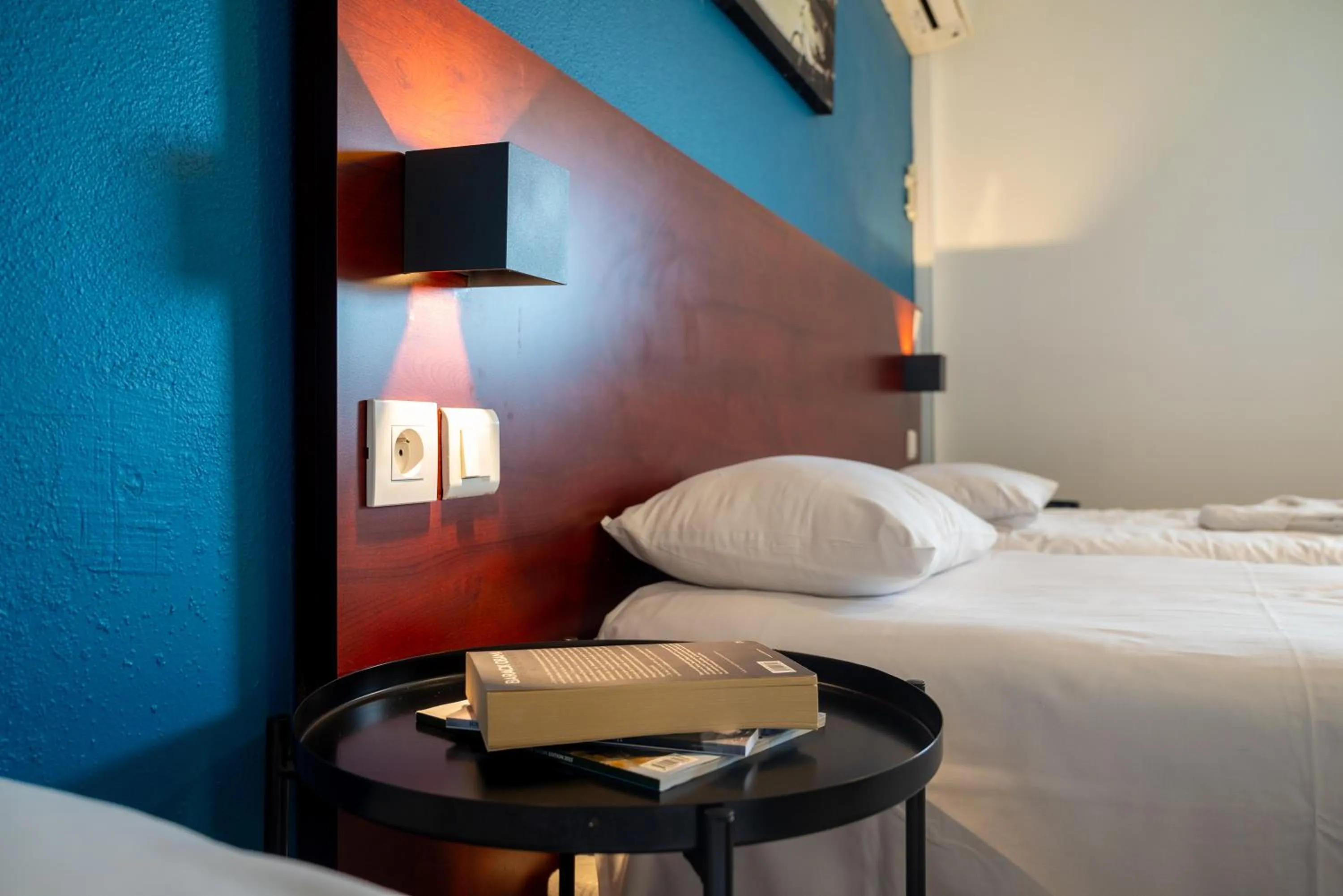 Decorative detail, Bed in Initial by Balladins Lyon Villefranche-sur-Saône