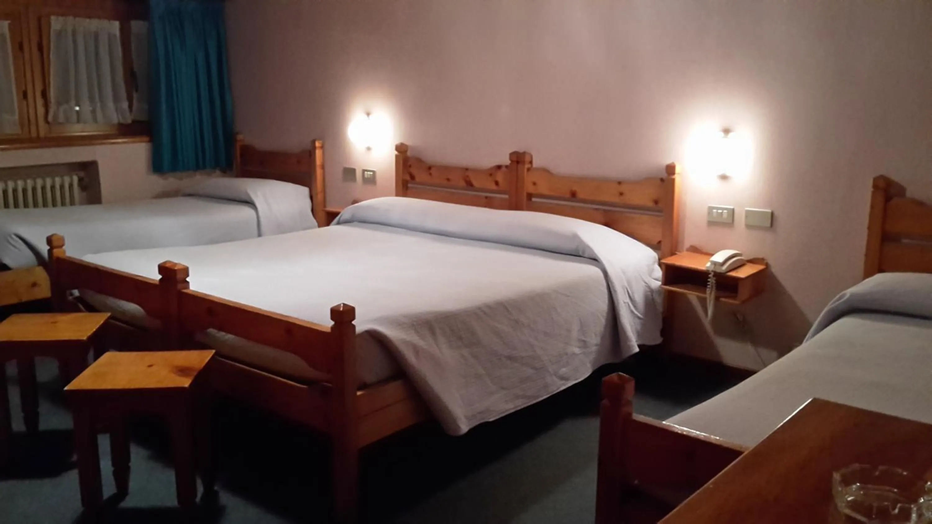 Bedroom in Hotel Mignon