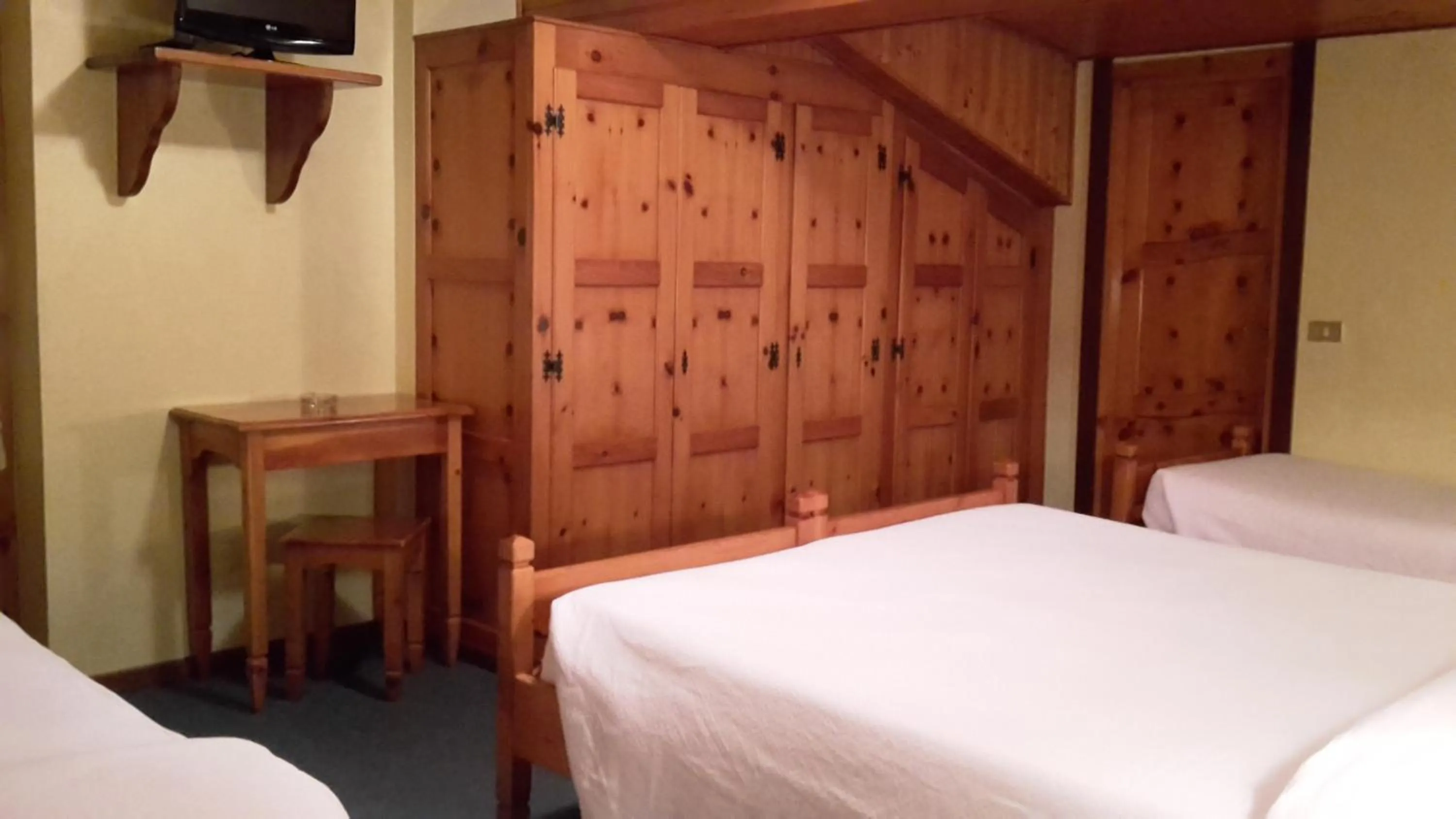 Bedroom in Hotel Mignon