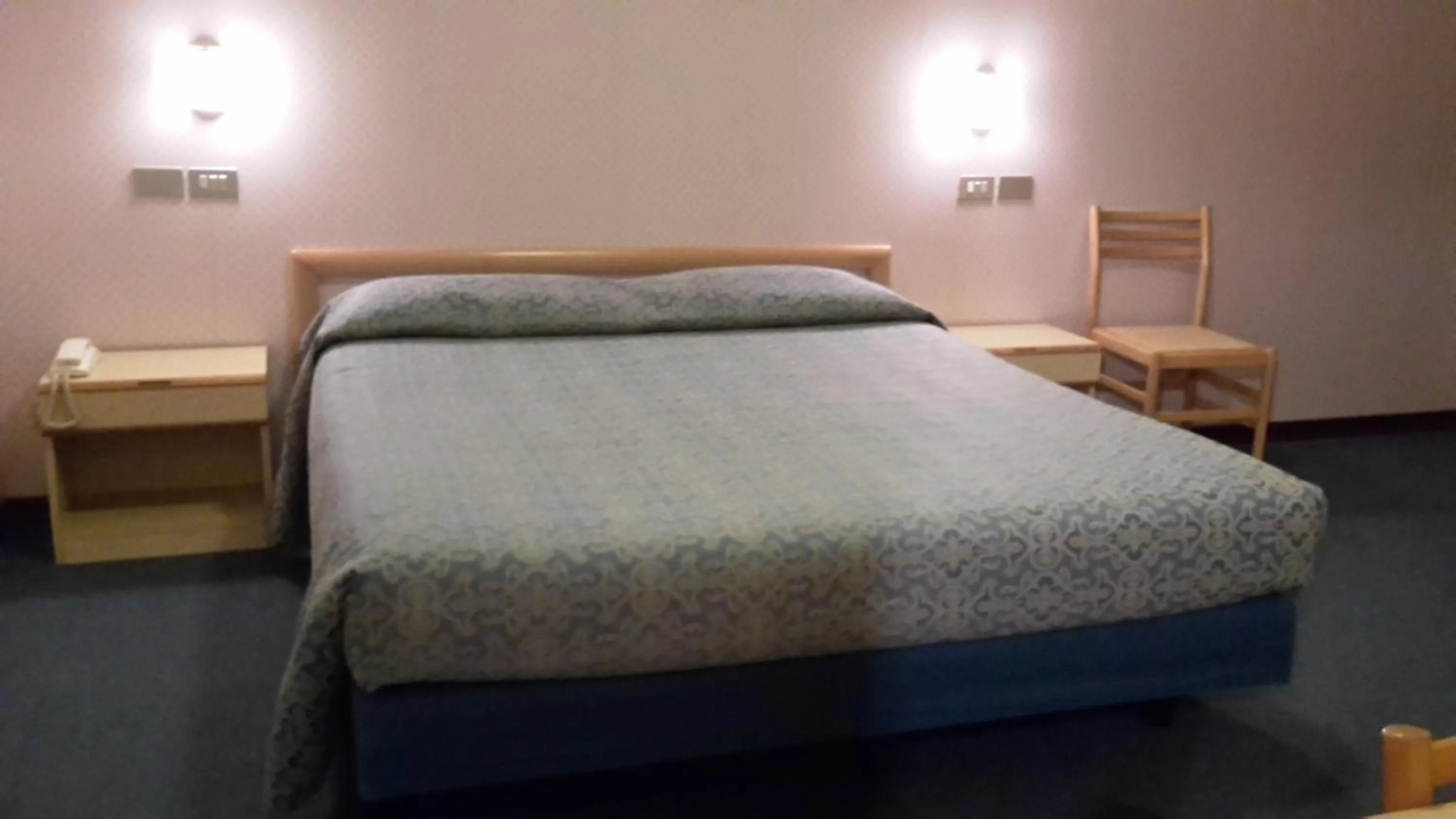 Bedroom in Hotel Mignon