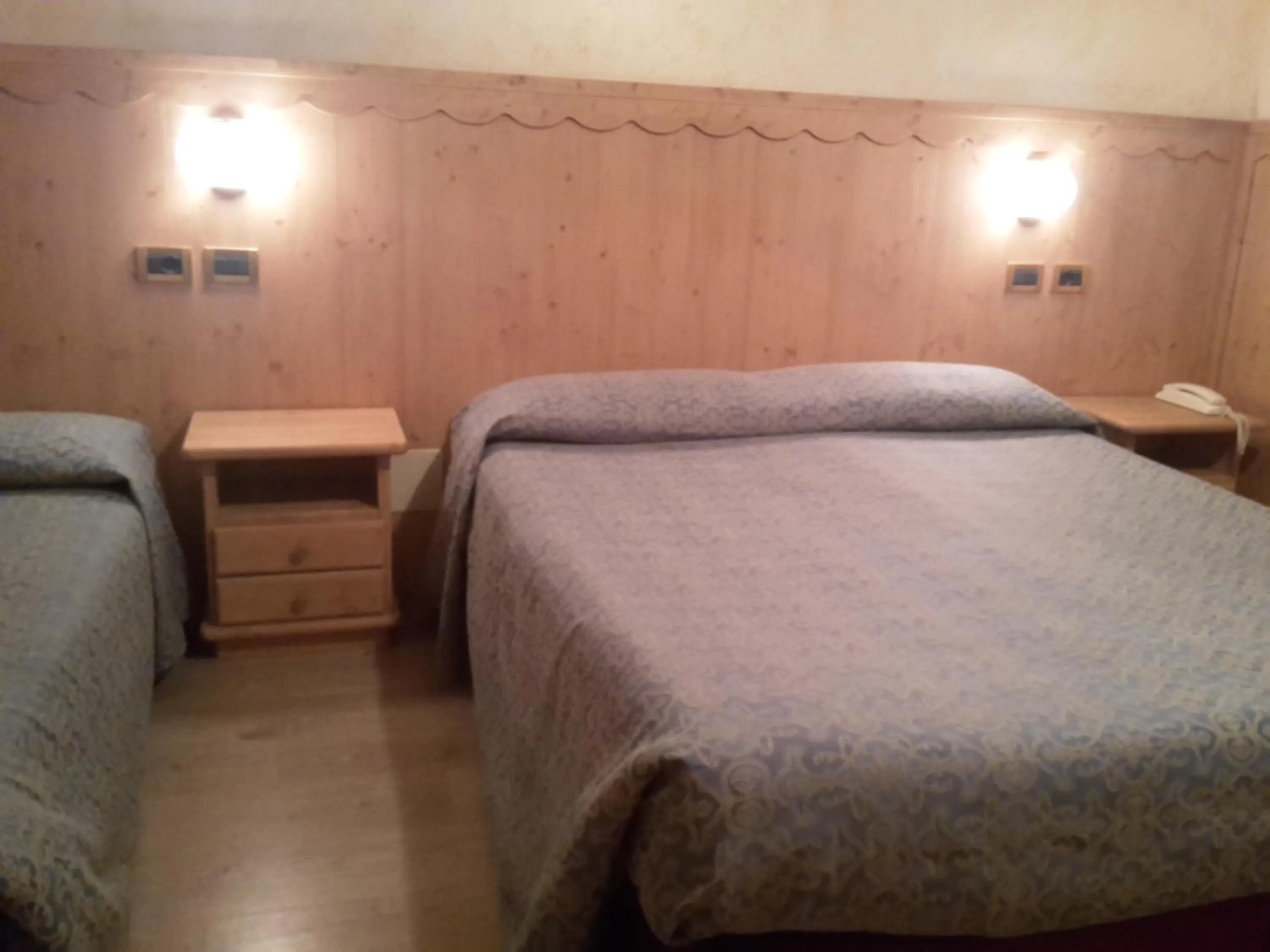 Bedroom in Hotel Mignon