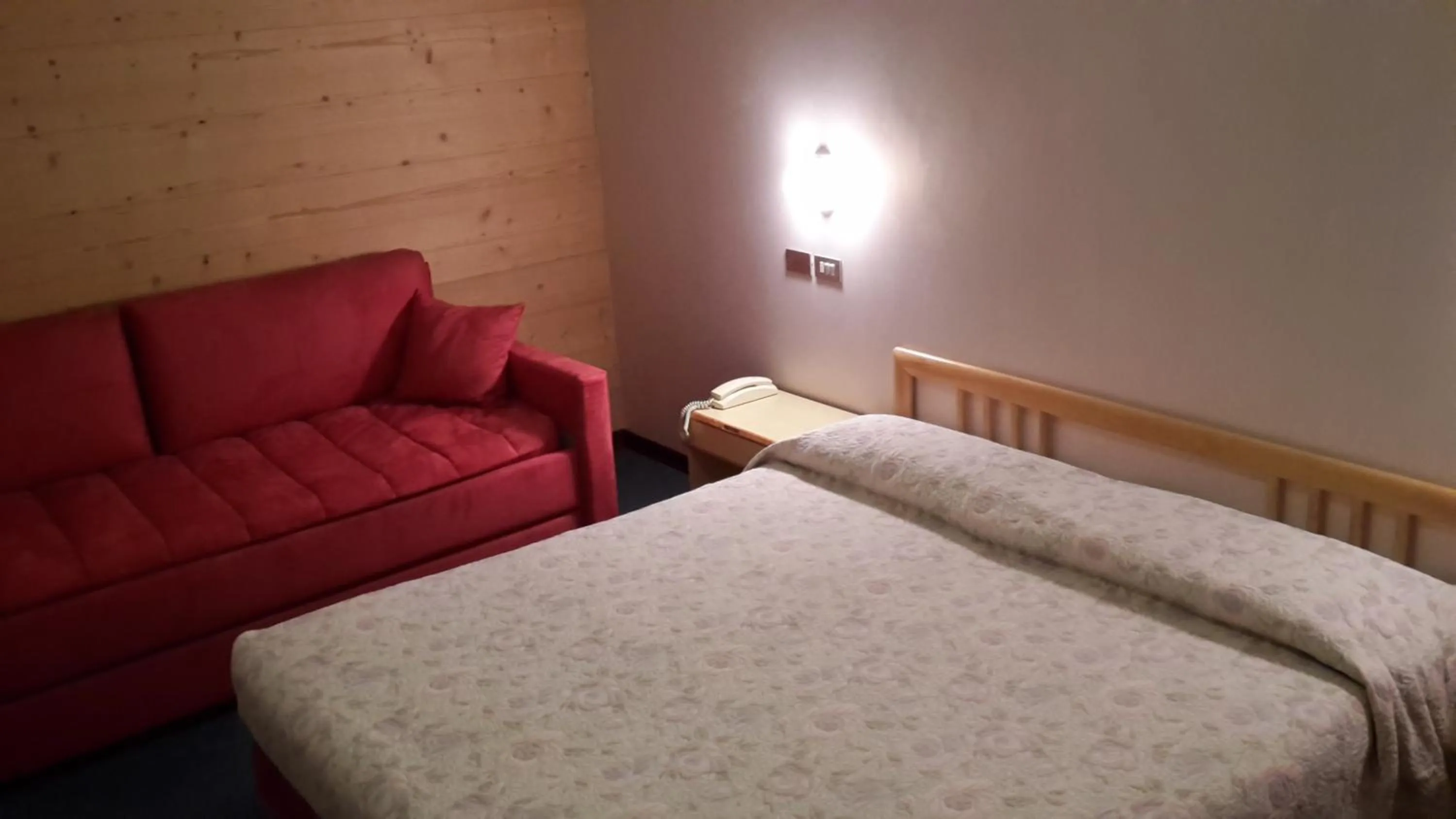 Bedroom in Hotel Mignon