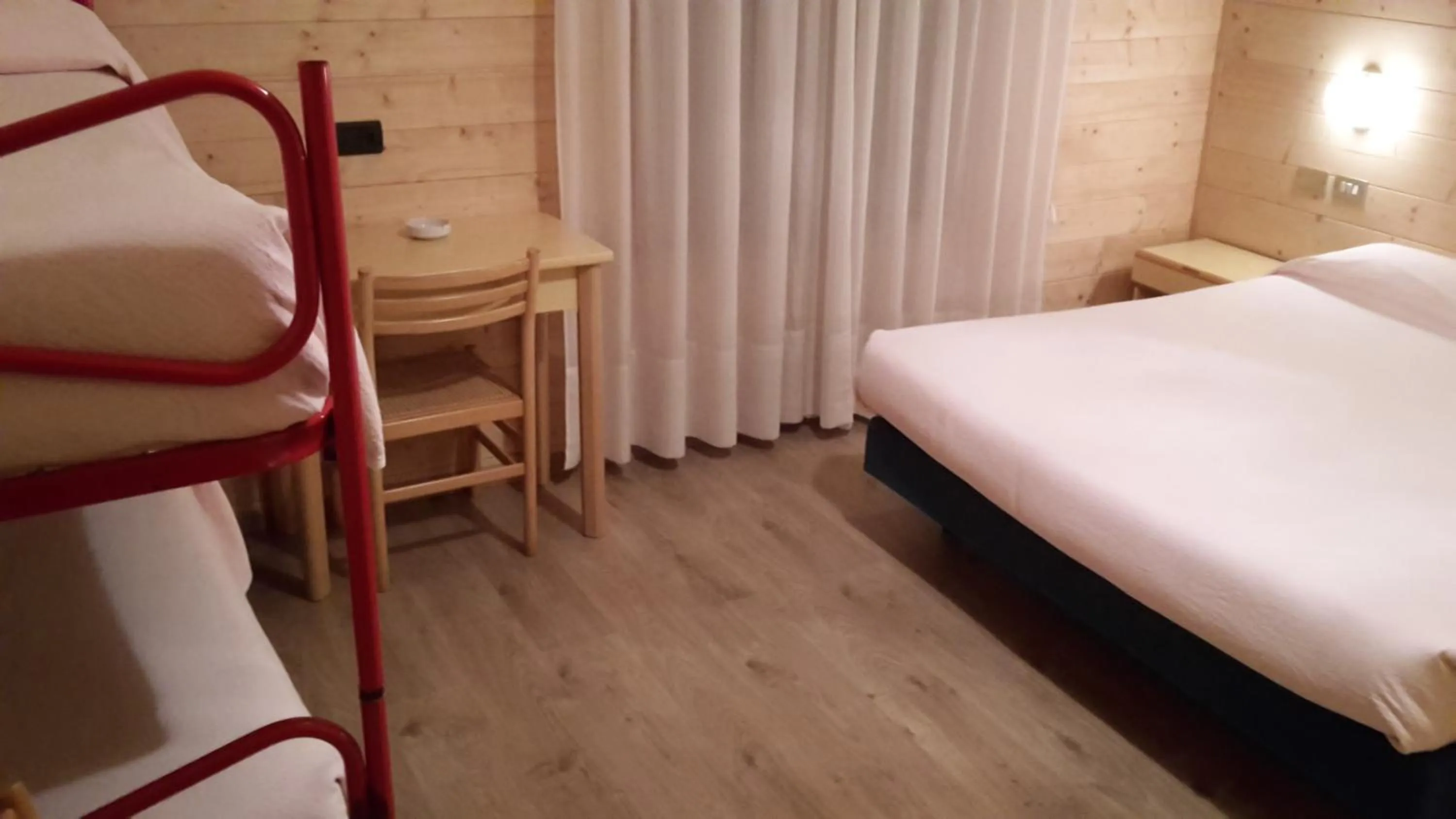 Bedroom in Hotel Mignon