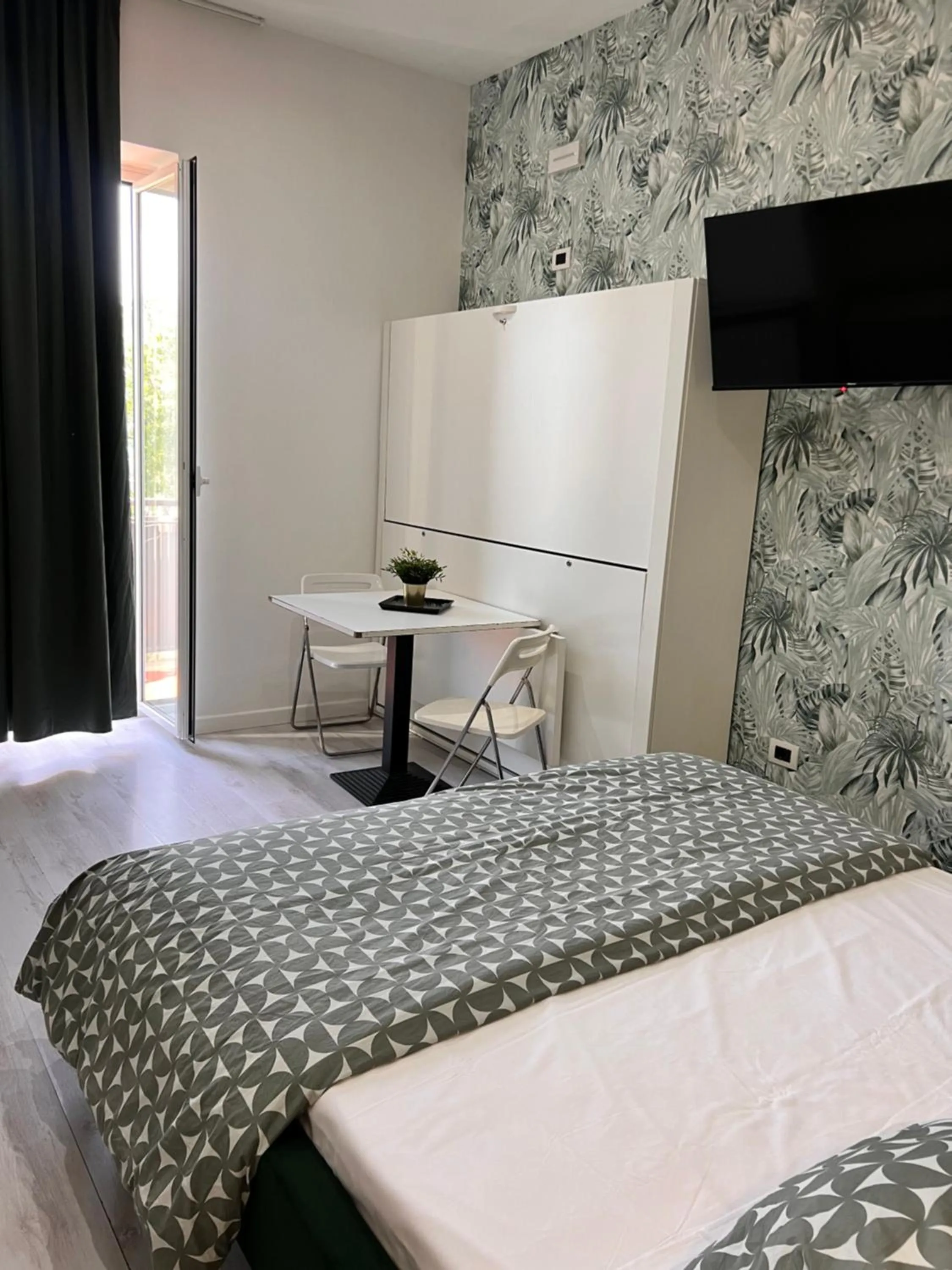 Quadruple Room with Balcony in Costantino Home