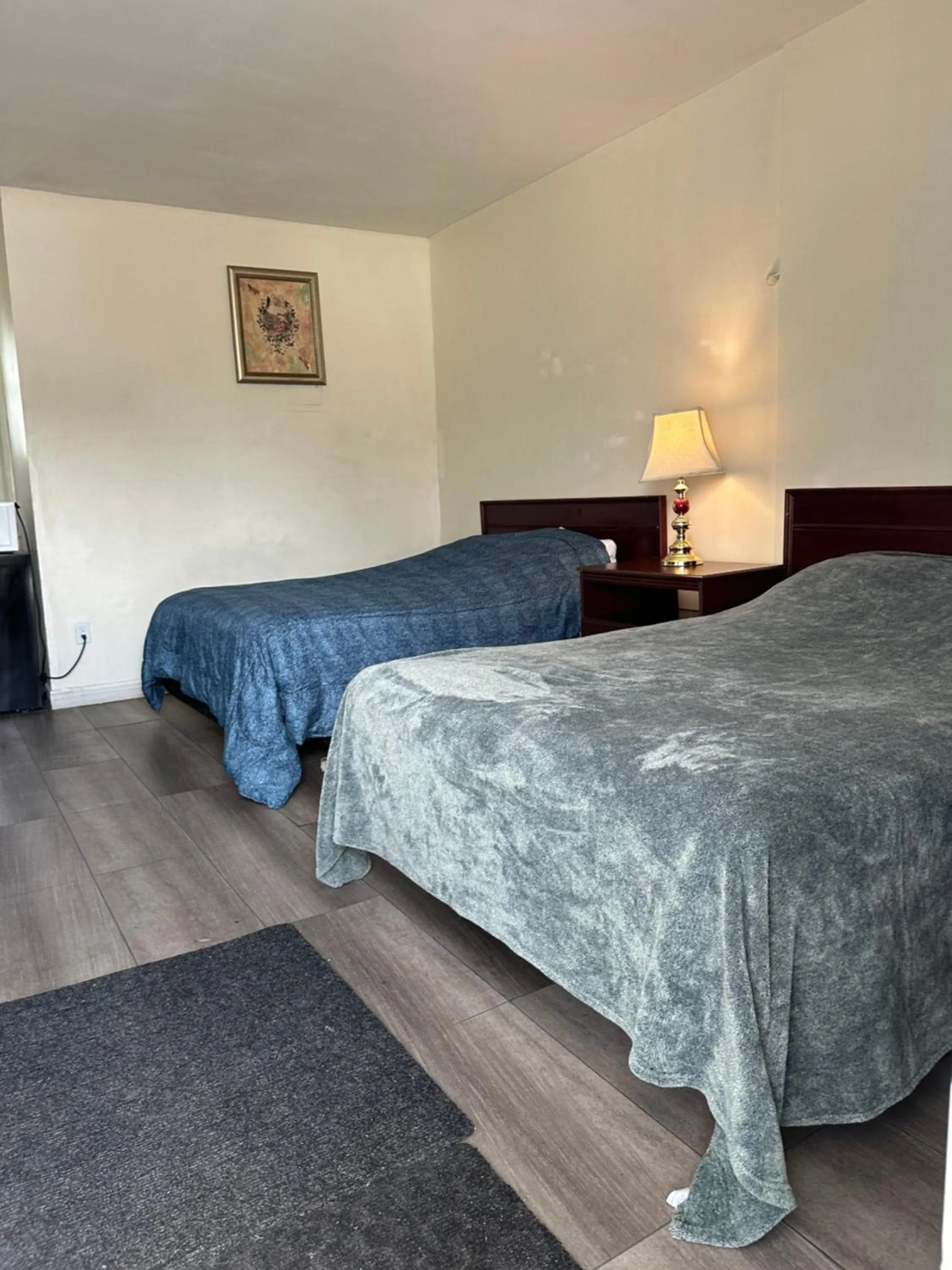 Bed in Carriage Inn Motel