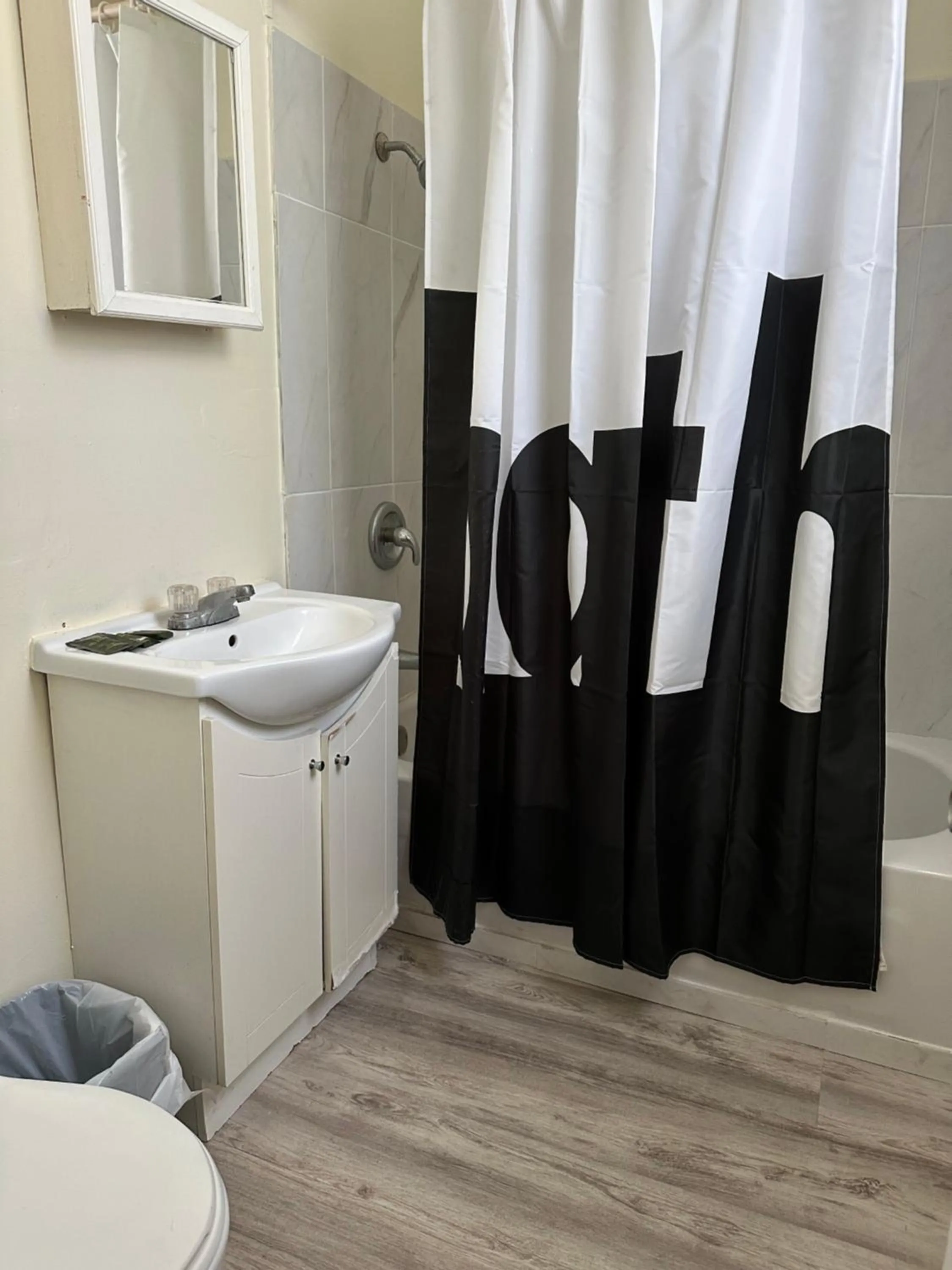 Toilet in Carriage Inn Motel
