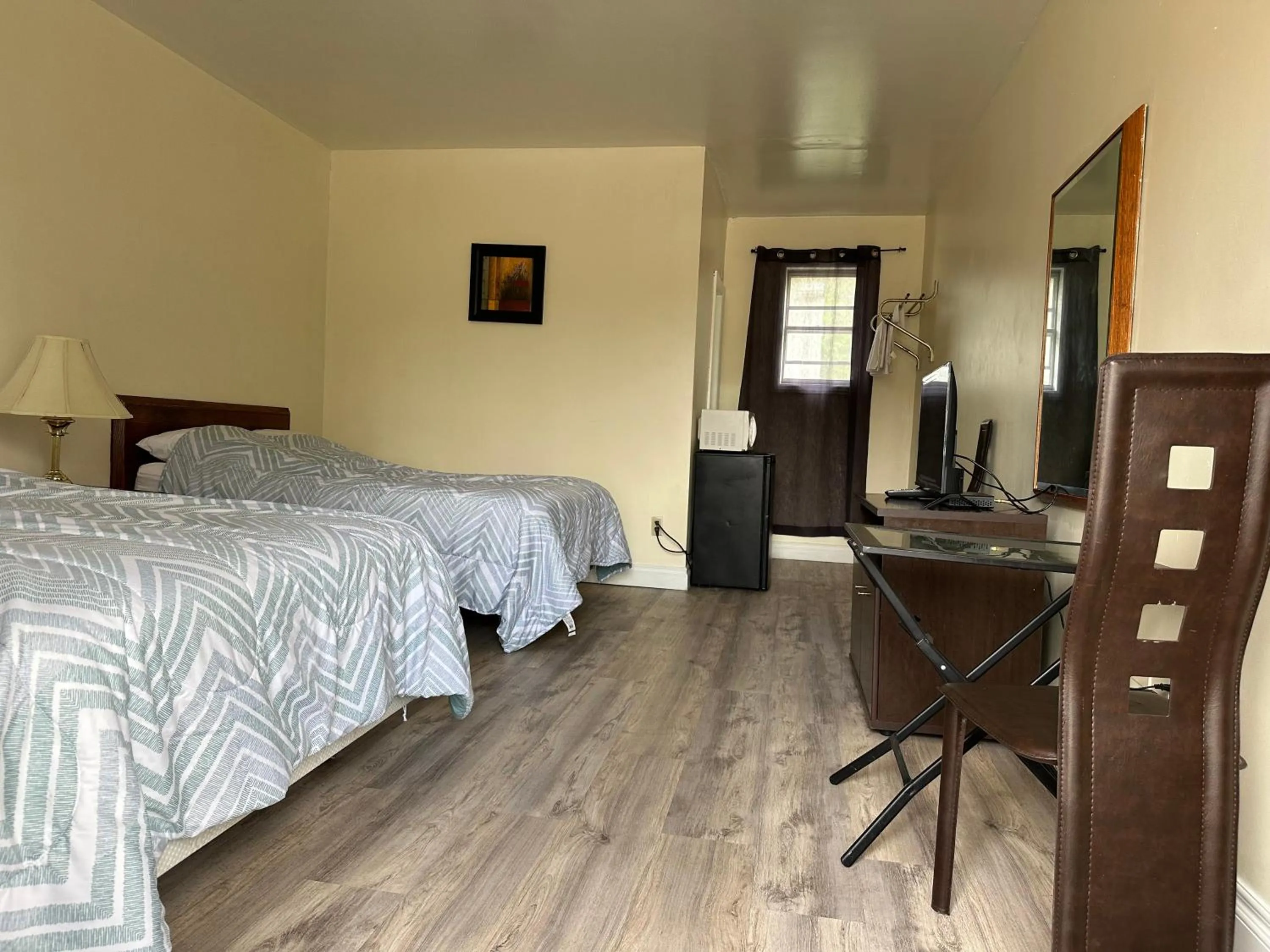 Bed in Carriage Inn Motel