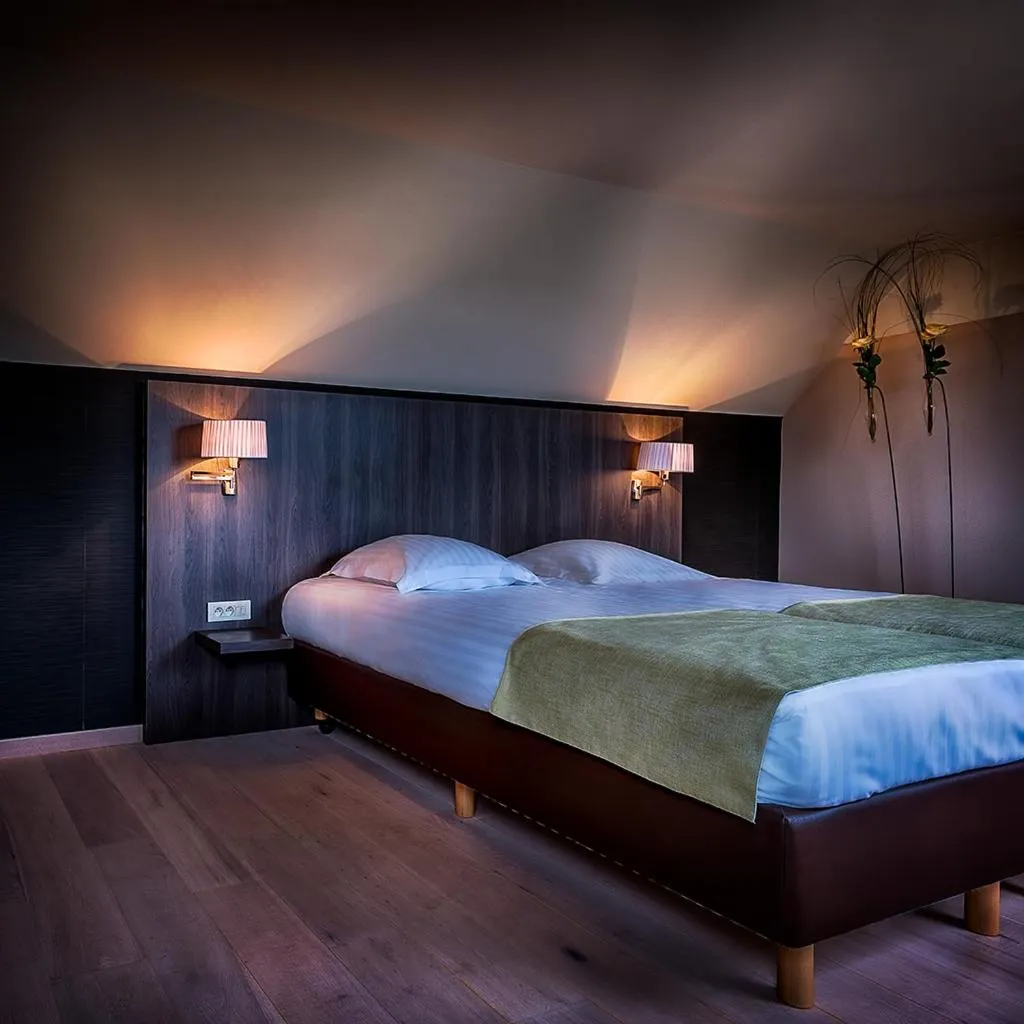 Bed in Cleythil Hotel