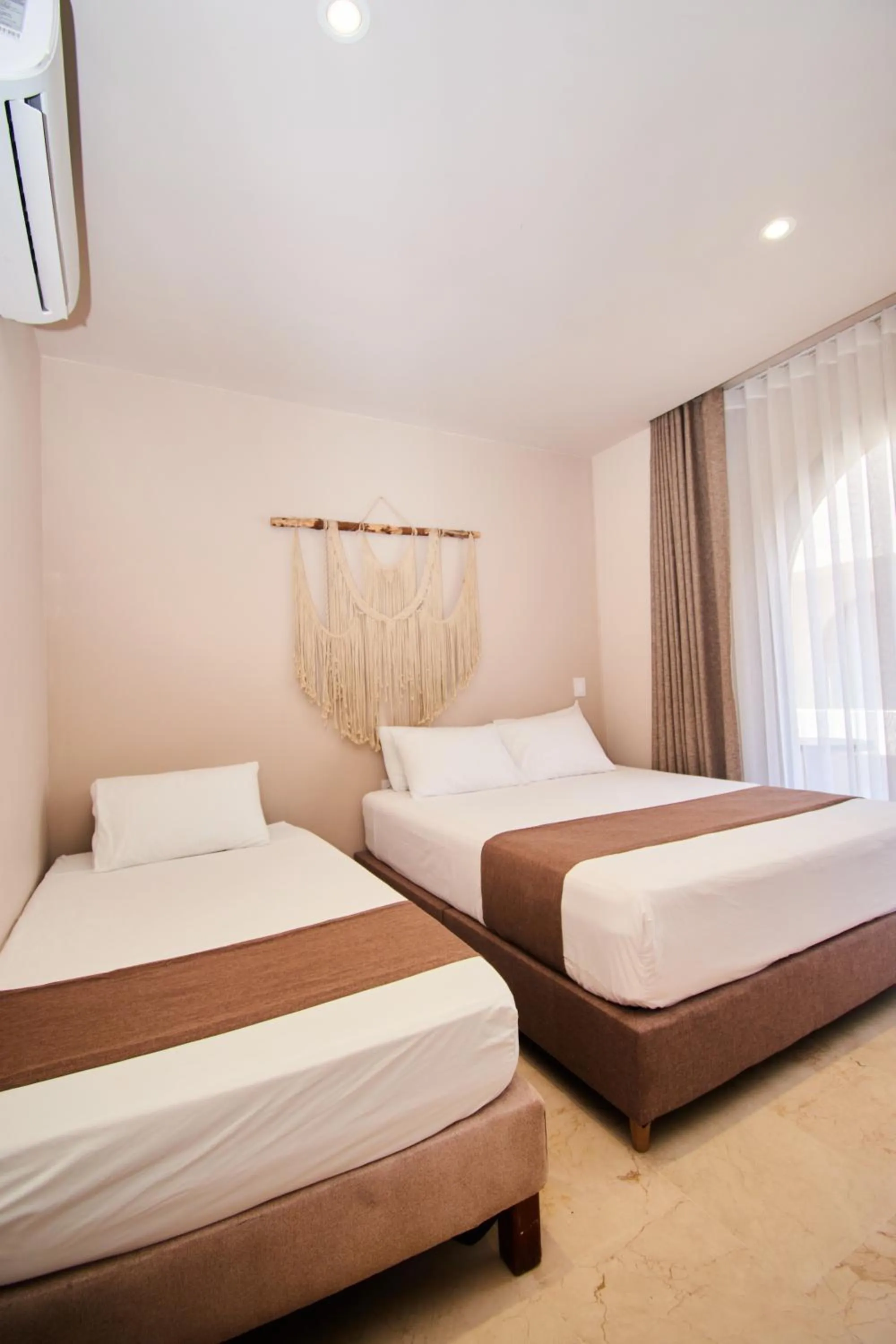 air conditioner, Bed in Loa Tolú by Bernalo Hotels