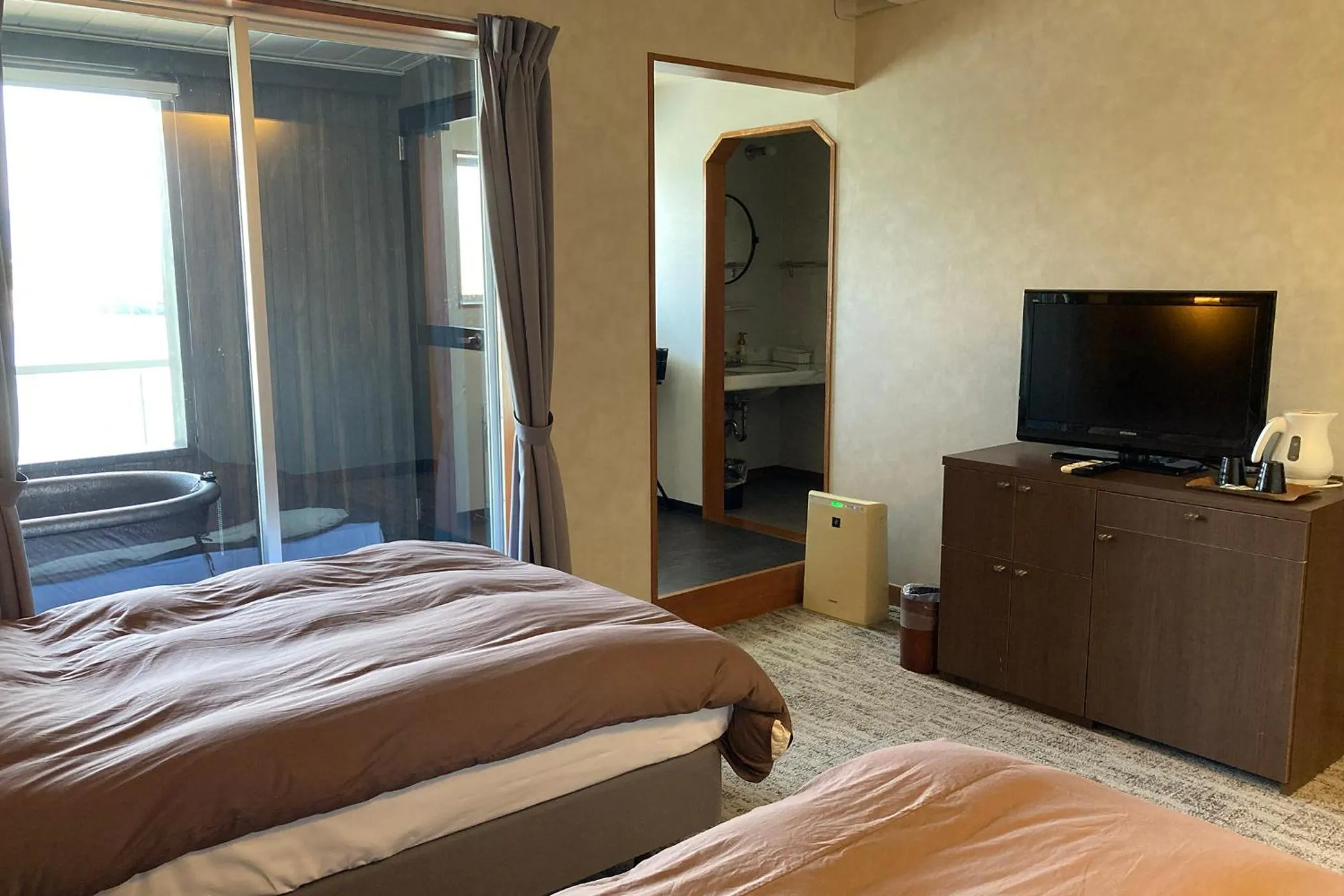 Photo of the whole room, Bed in Ooedo Onsen Monogatari Premium Shirahama Saichoraku