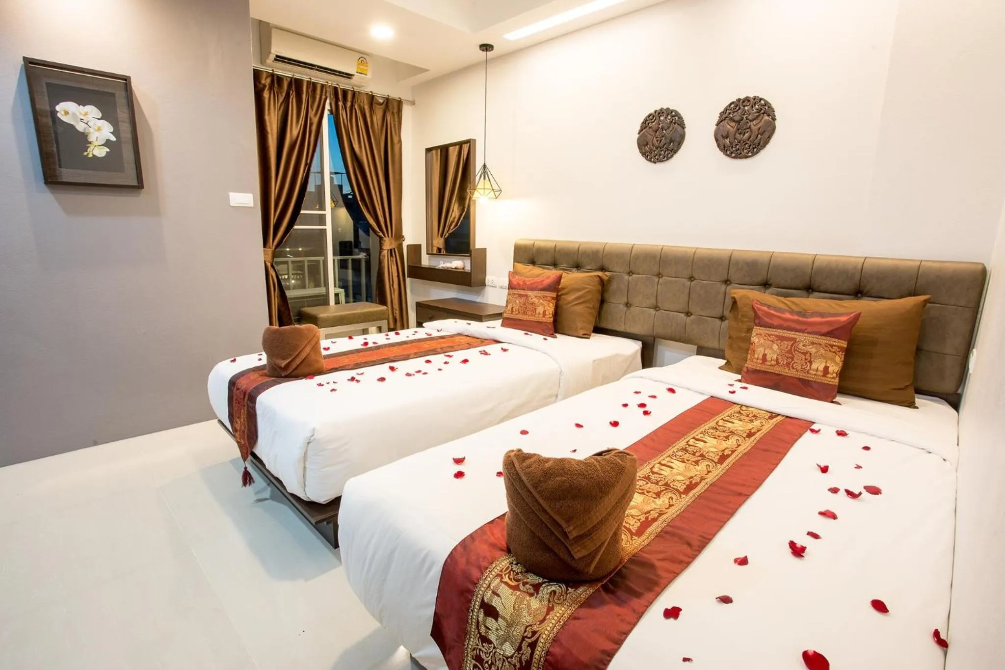 Photo of the whole room, Bed in Pongsakorn Boutique Resort