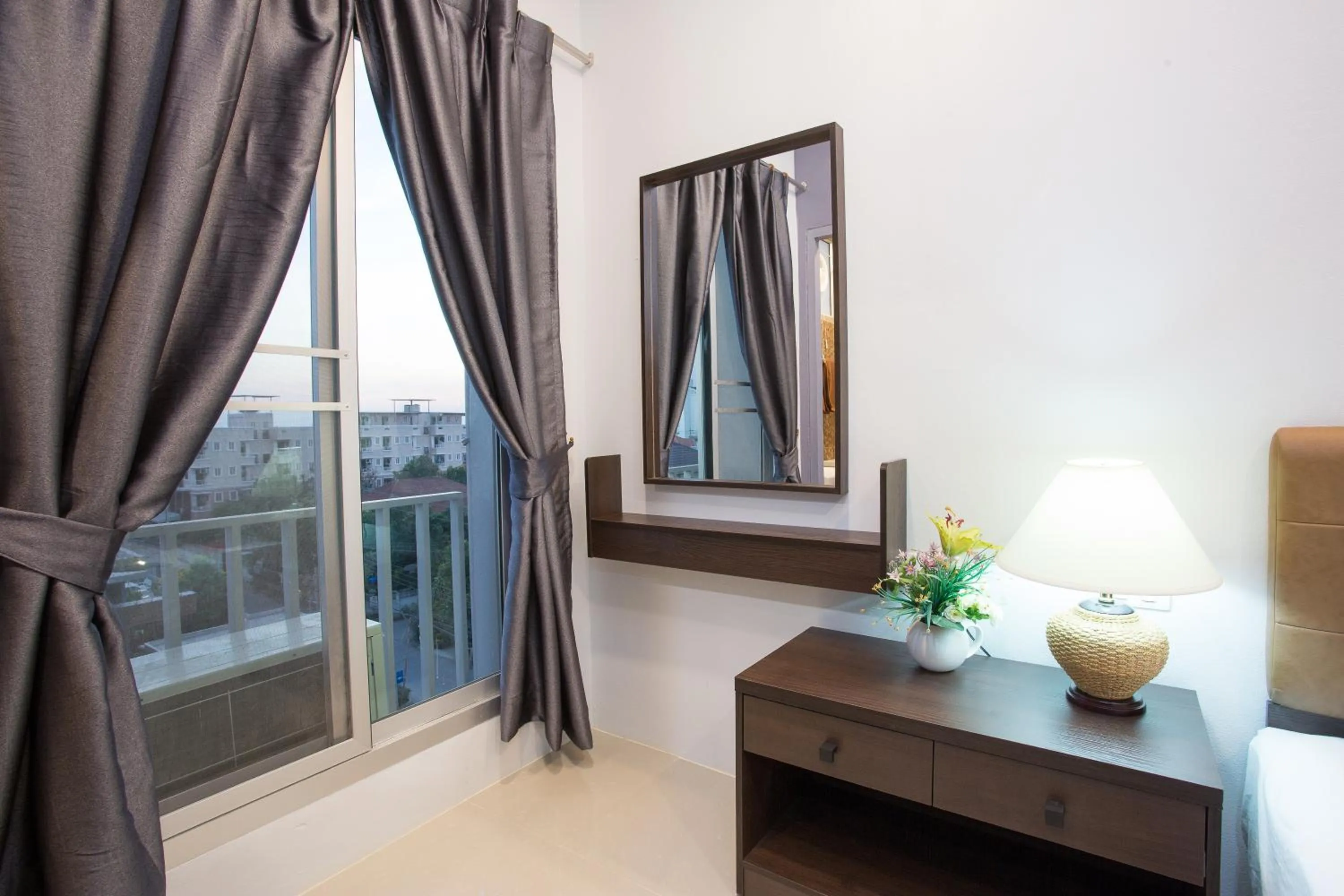 Photo of the whole room, Bed in Pongsakorn Boutique Resort