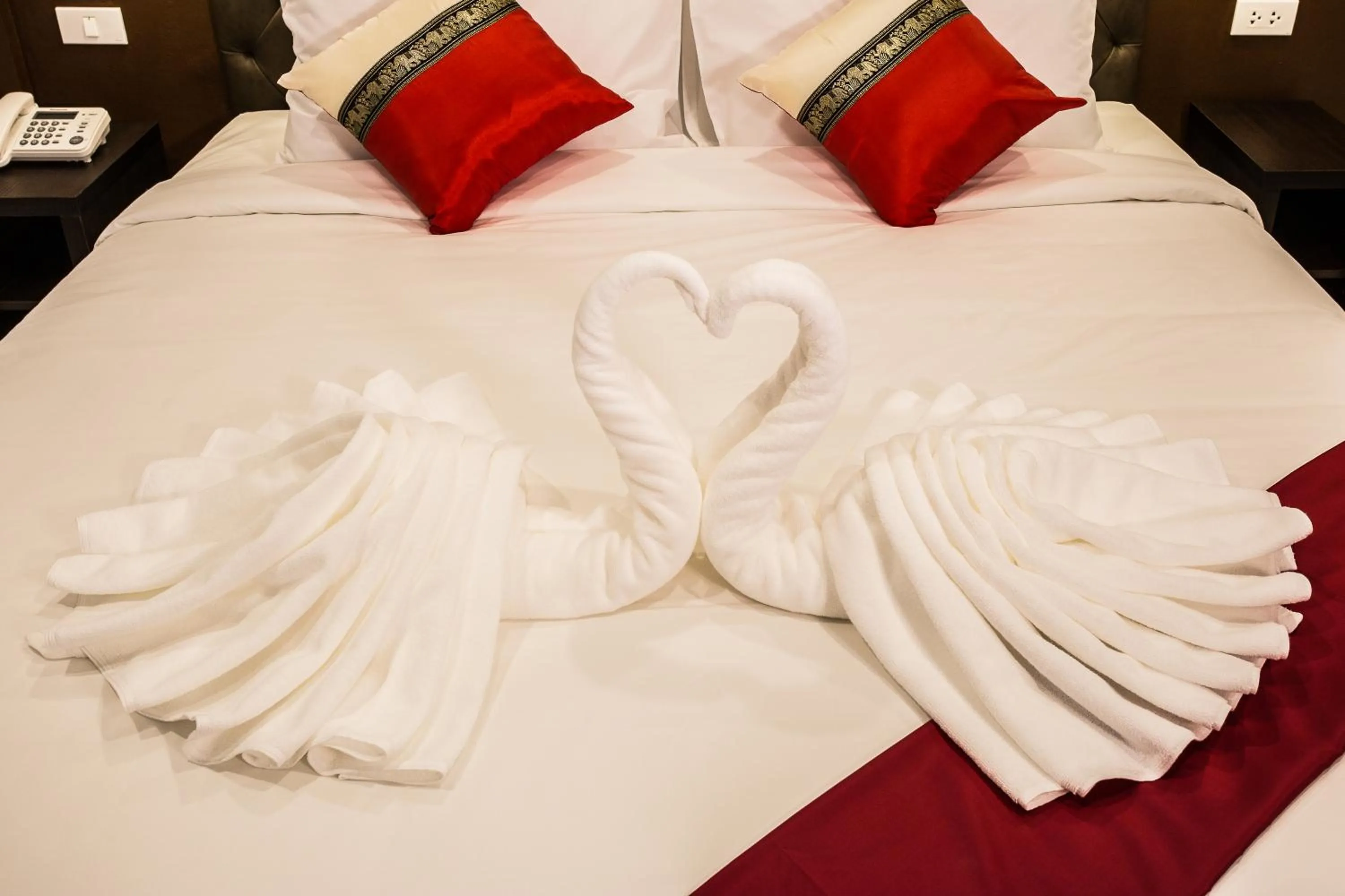 Decorative detail, Bed in Pongsakorn Boutique Resort