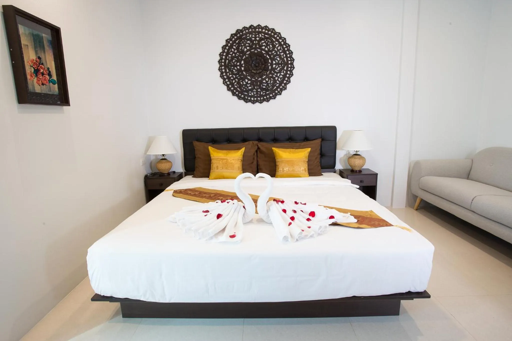 Bed in Pongsakorn Boutique Resort