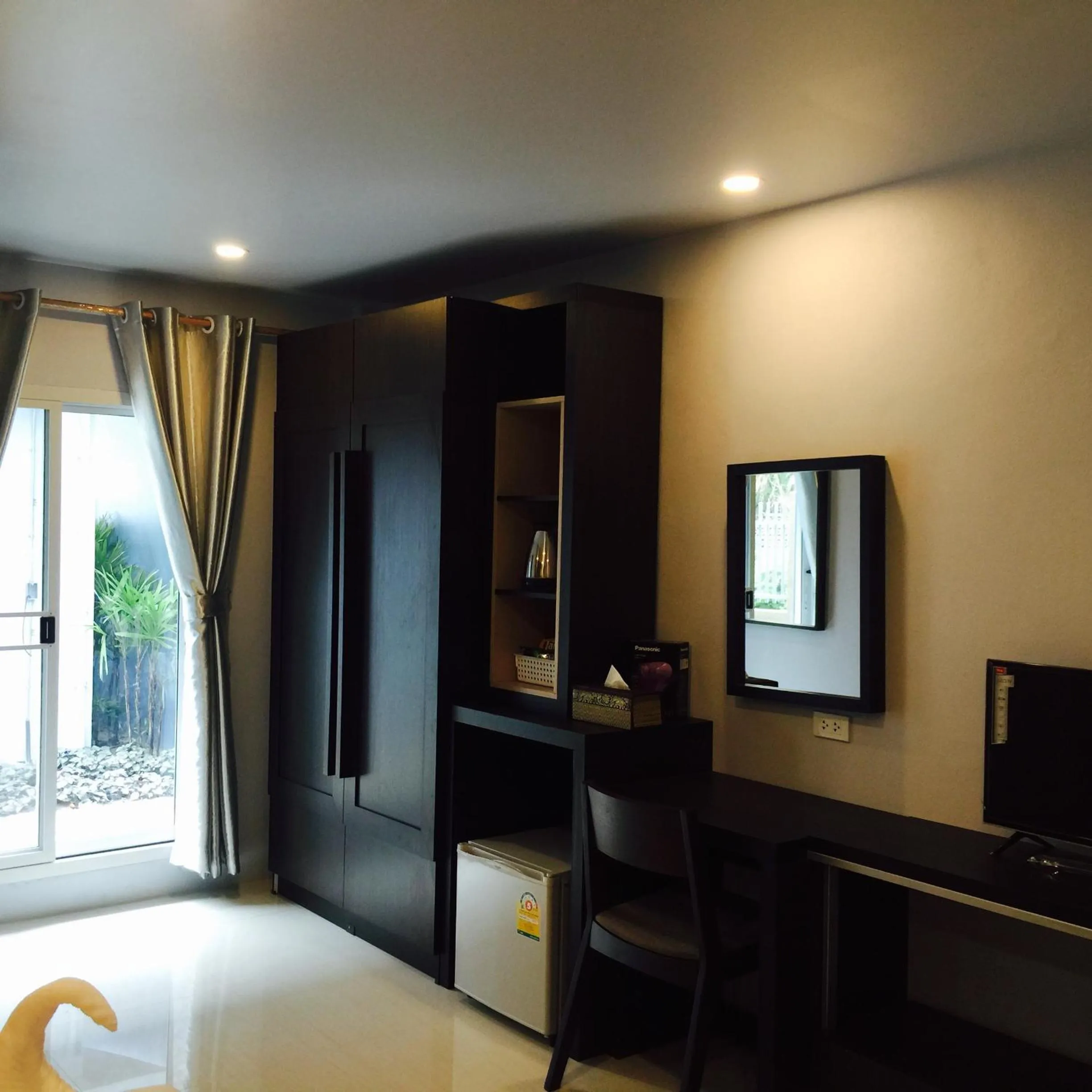 Photo of the whole room, Bed in Pongsakorn Boutique Resort