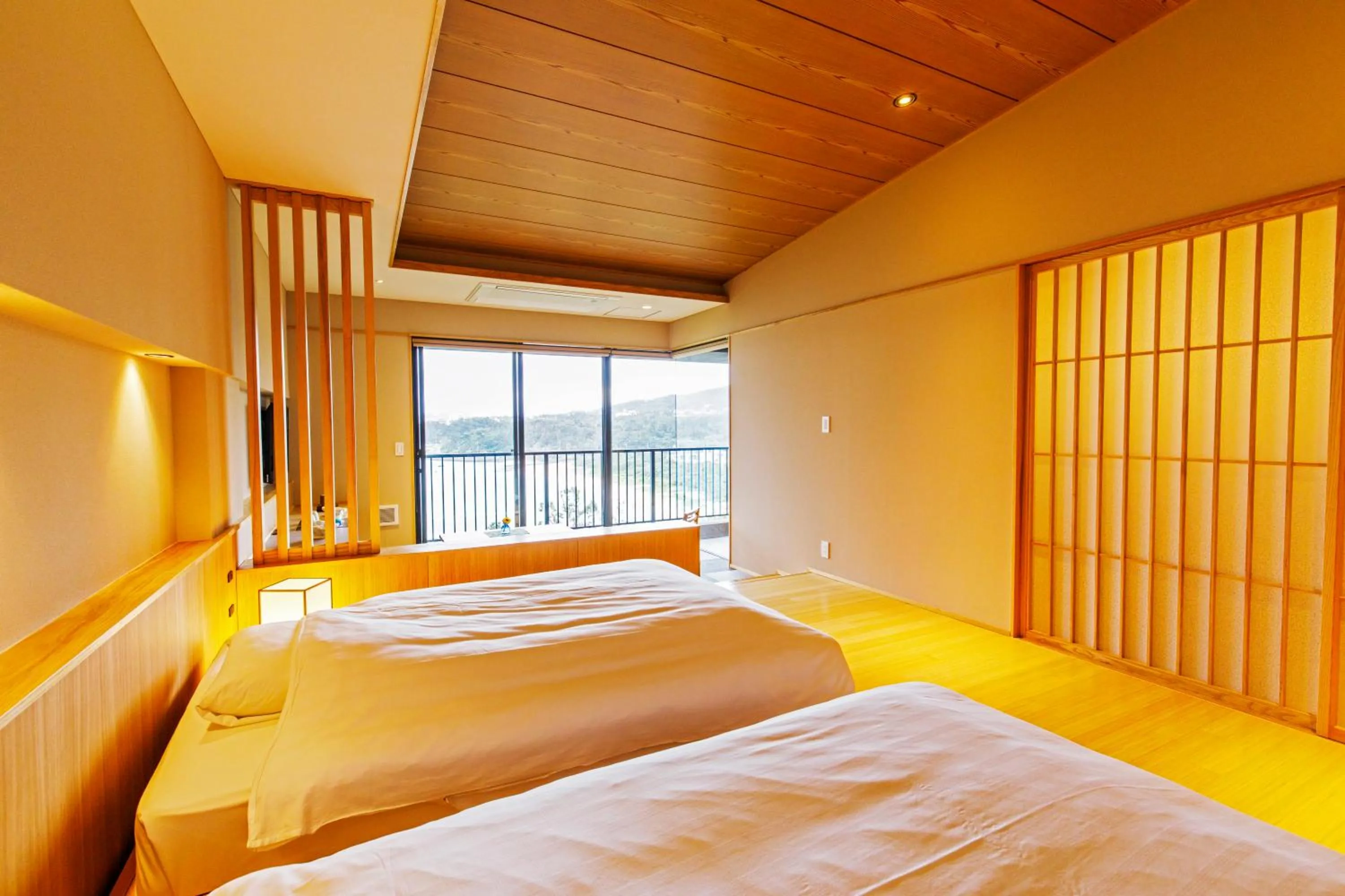 Photo of the whole room, Bed in Umino Ryotei Okinawa Nakamasou