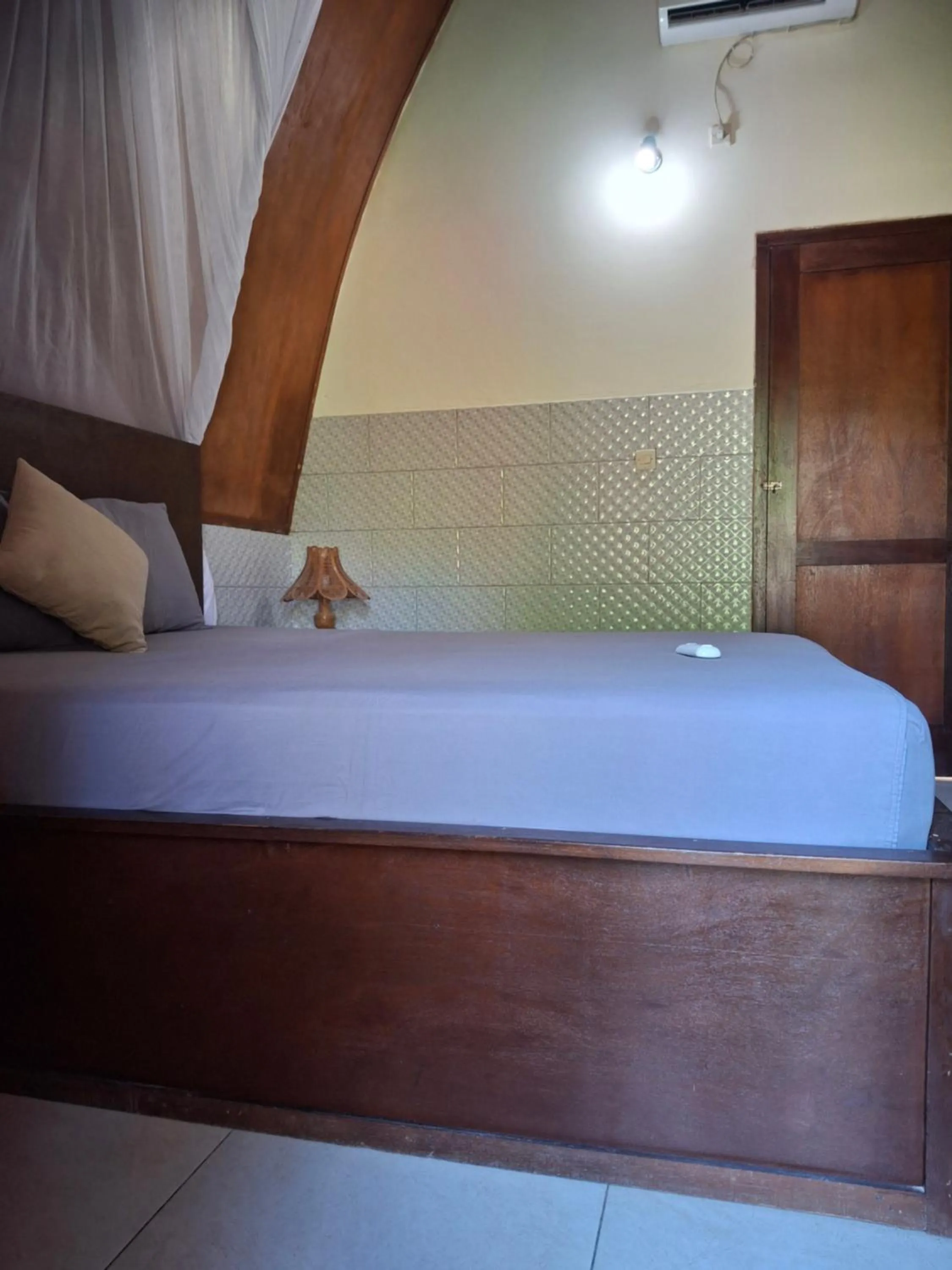 Bed in Cnunk Bungalow