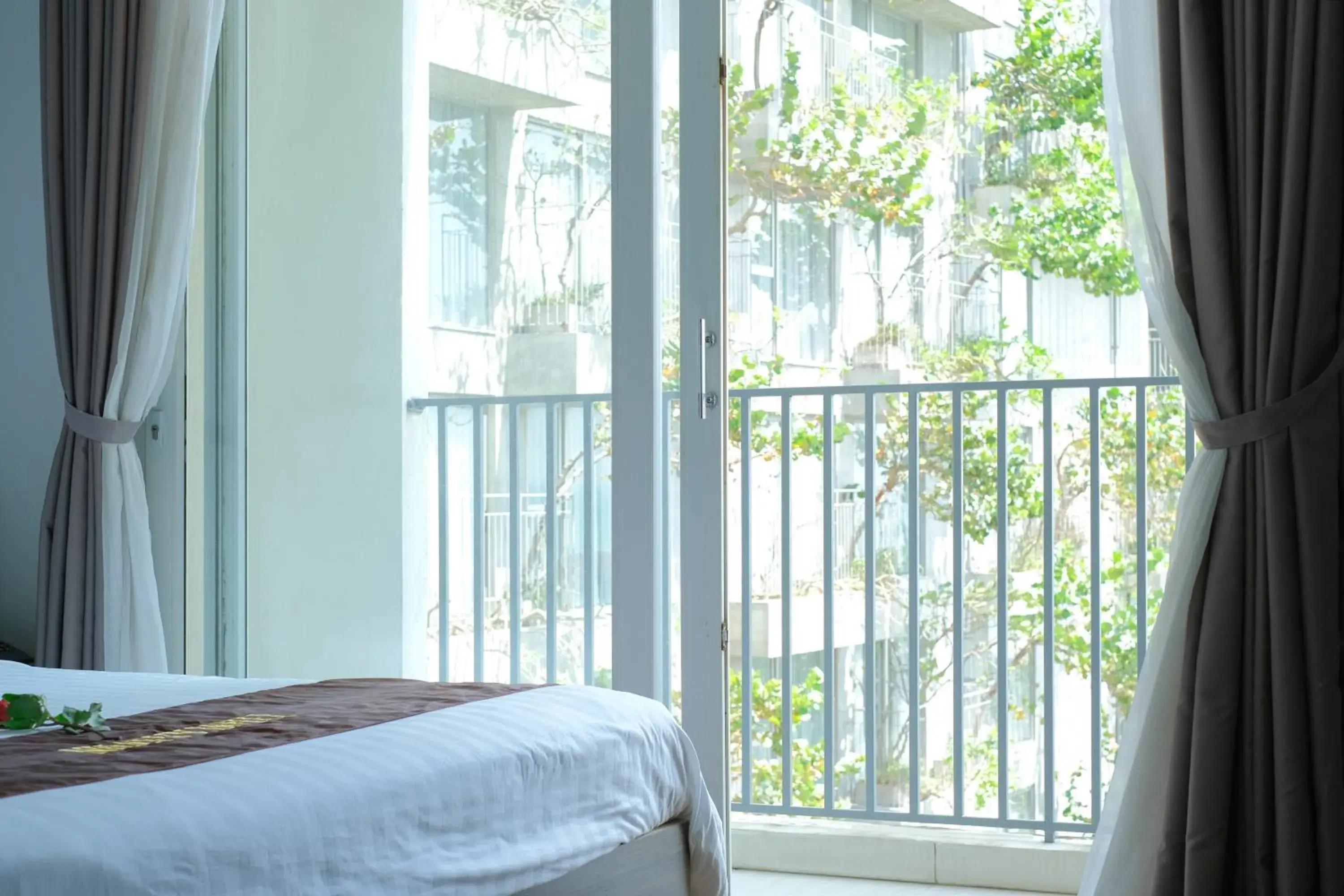 View (from property/room), Bed in Rich Hotel View (from property/room), Bed in Rich Hotel