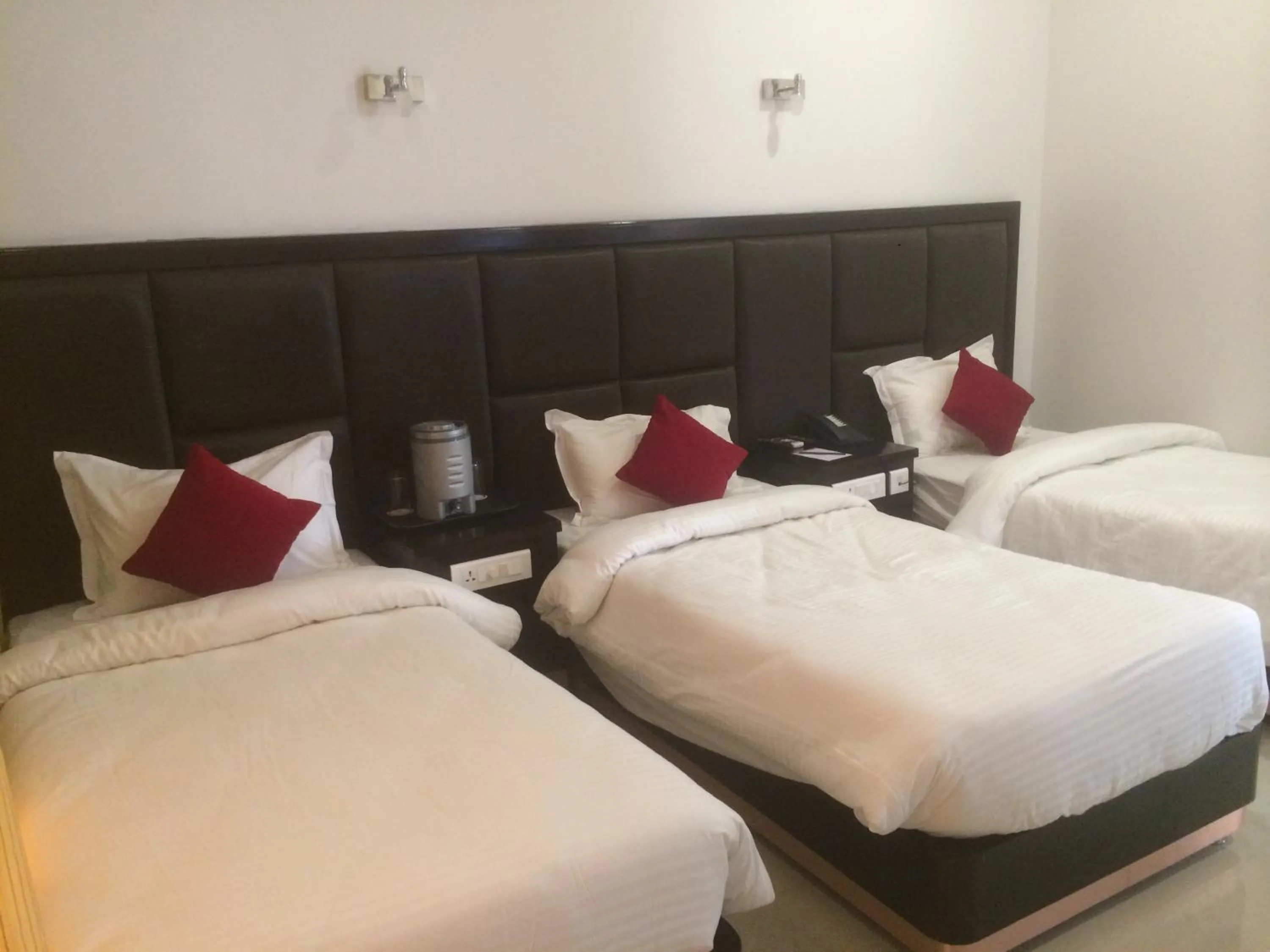 Photo of the whole room, Bed in Chandra Grand