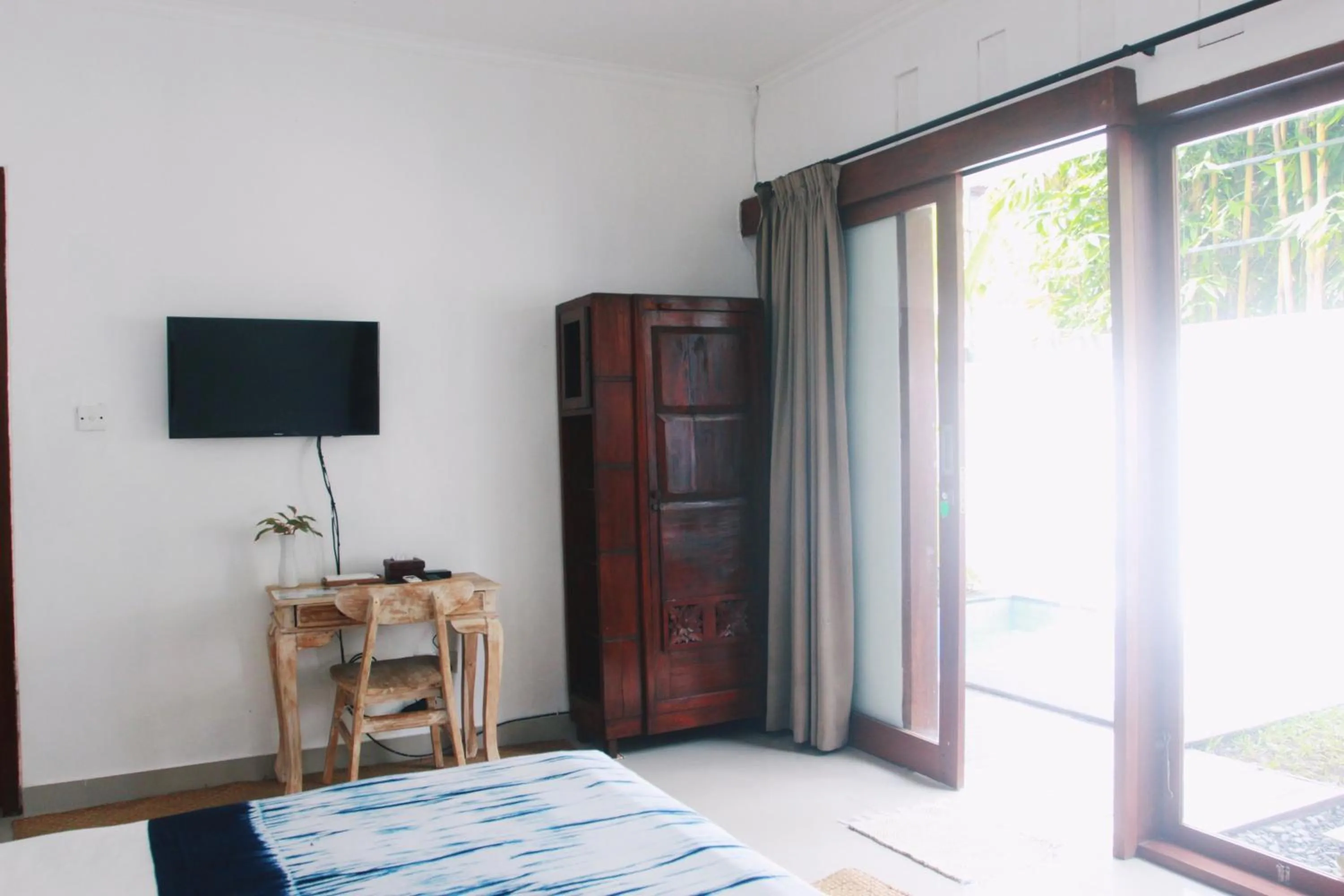 Bedroom in ThanTha Ubud Villa