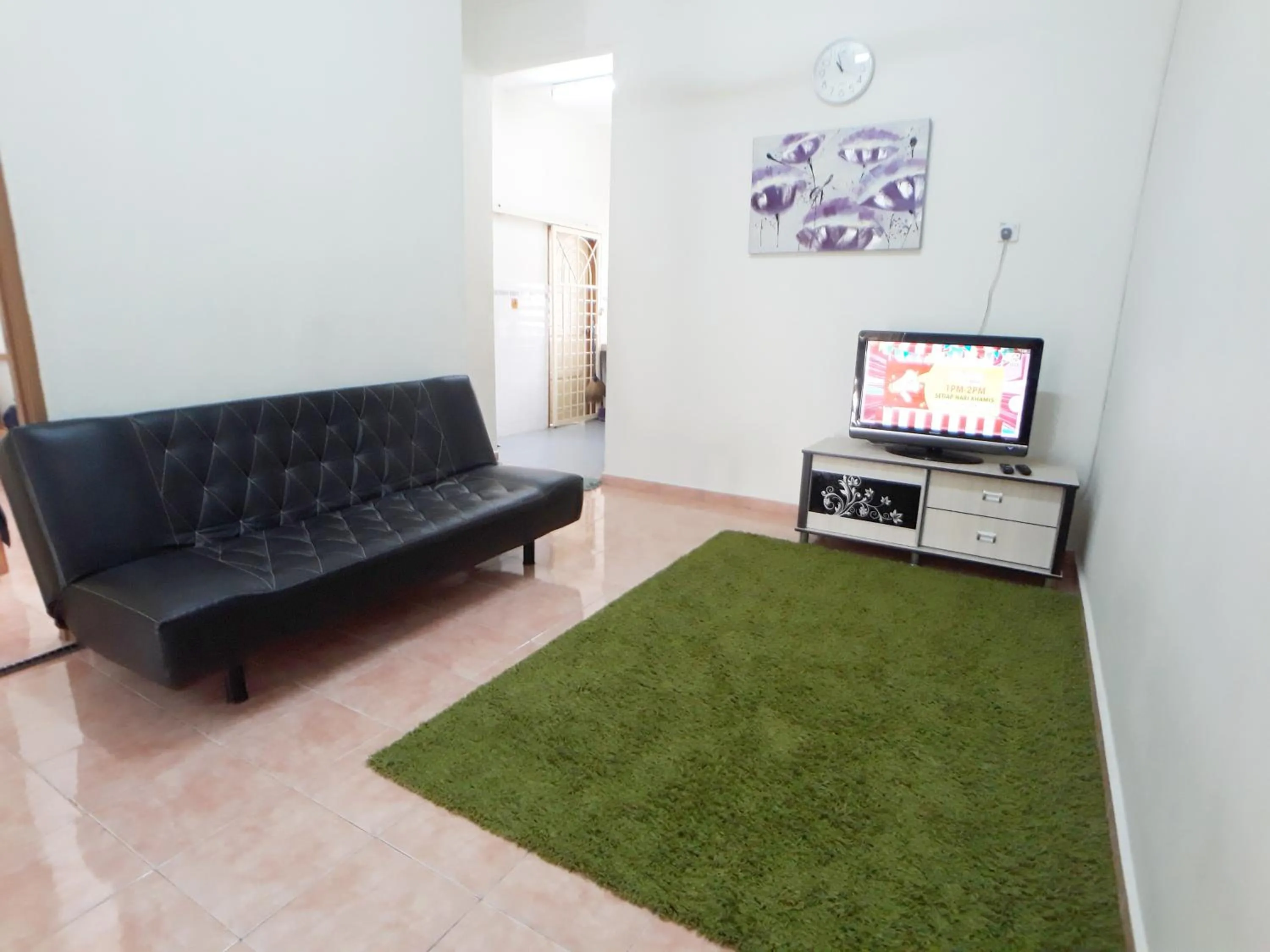 Communal lounge/ TV room in JJ Melaka Holiday home