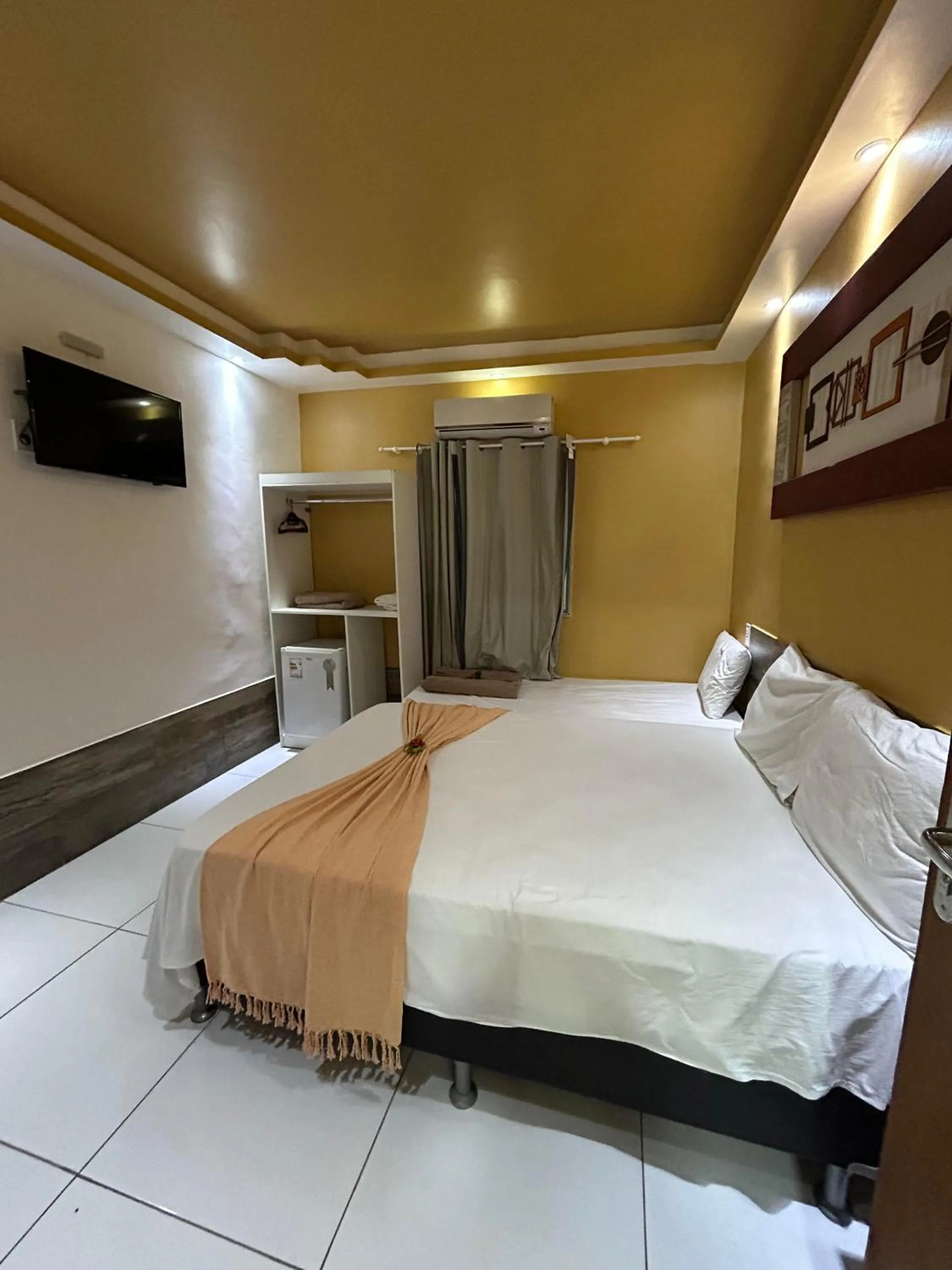 Bed in Pousada Caminho do Pontal