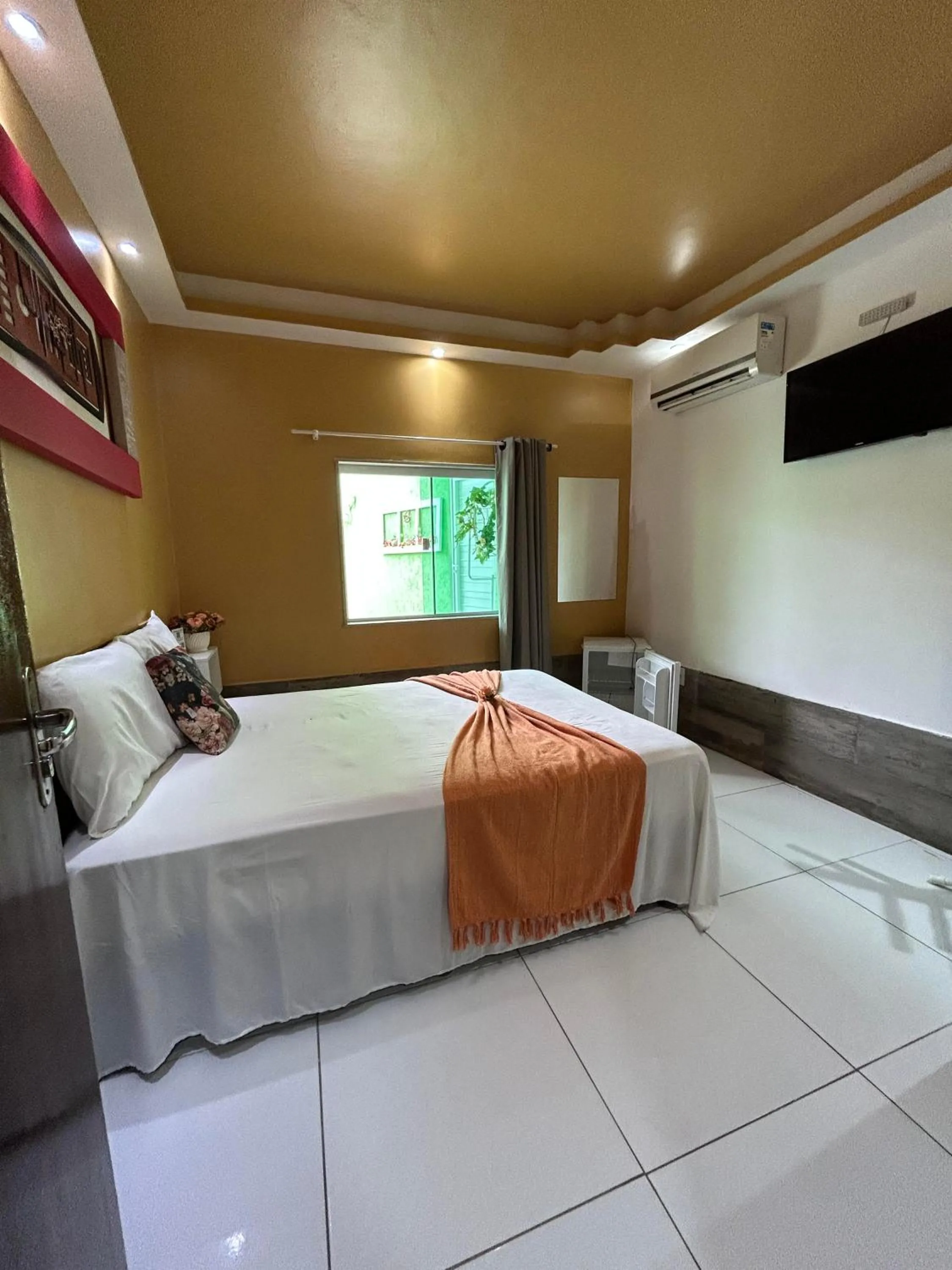 Bed in Pousada Caminho do Pontal