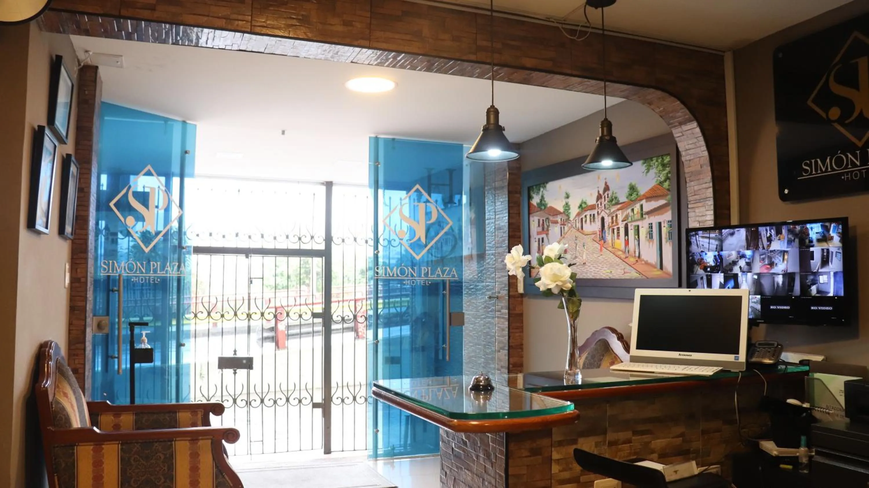 Lobby or reception in Hotel Simón Plaza