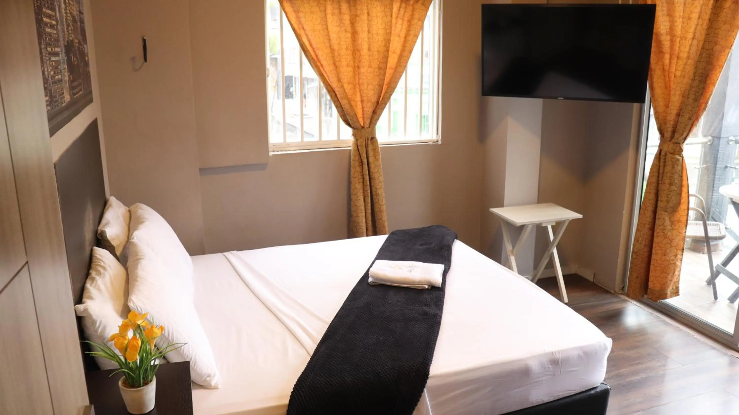 Bed in Hotel Simón Plaza