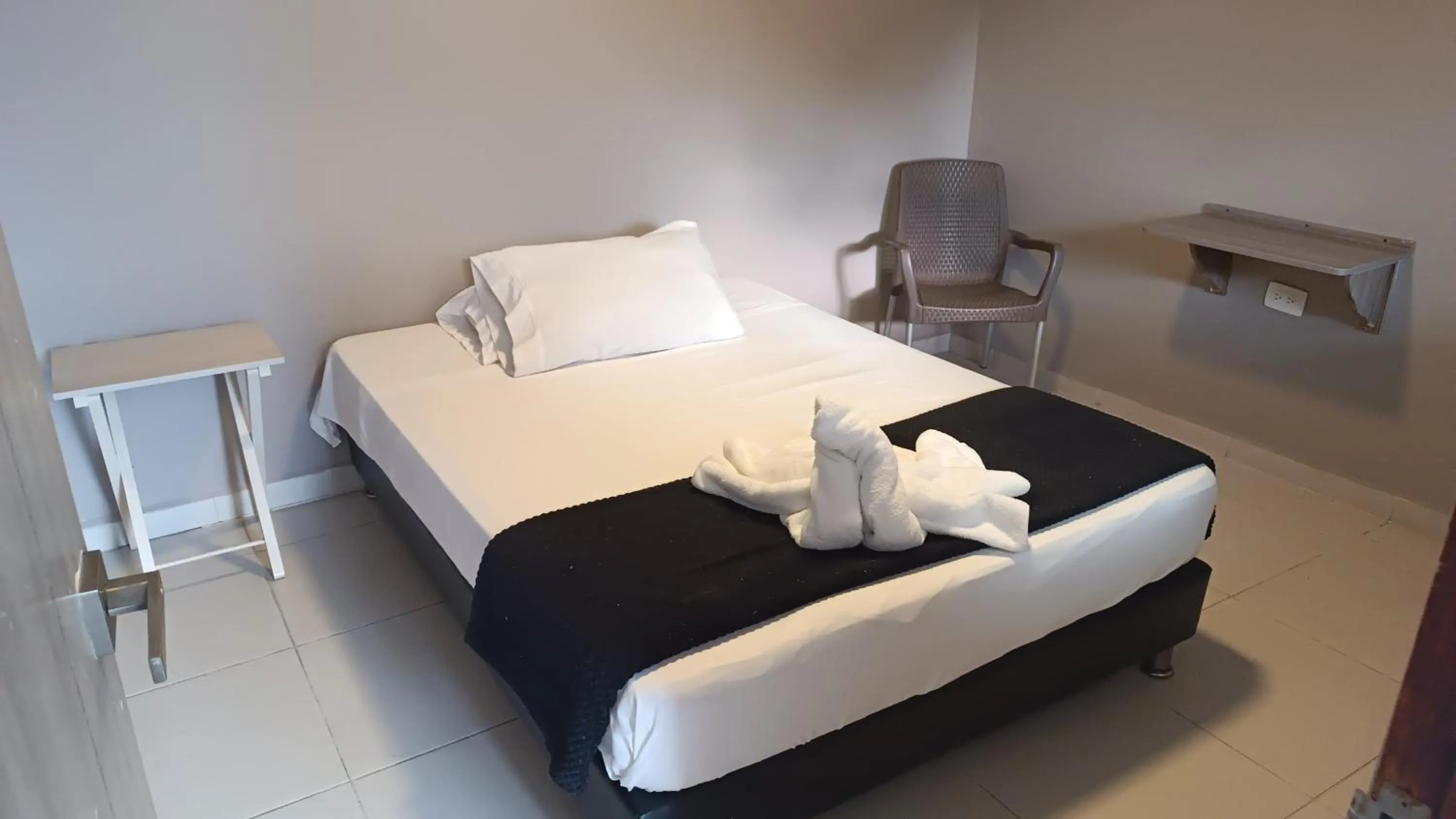 Bed in Hotel Simón Plaza