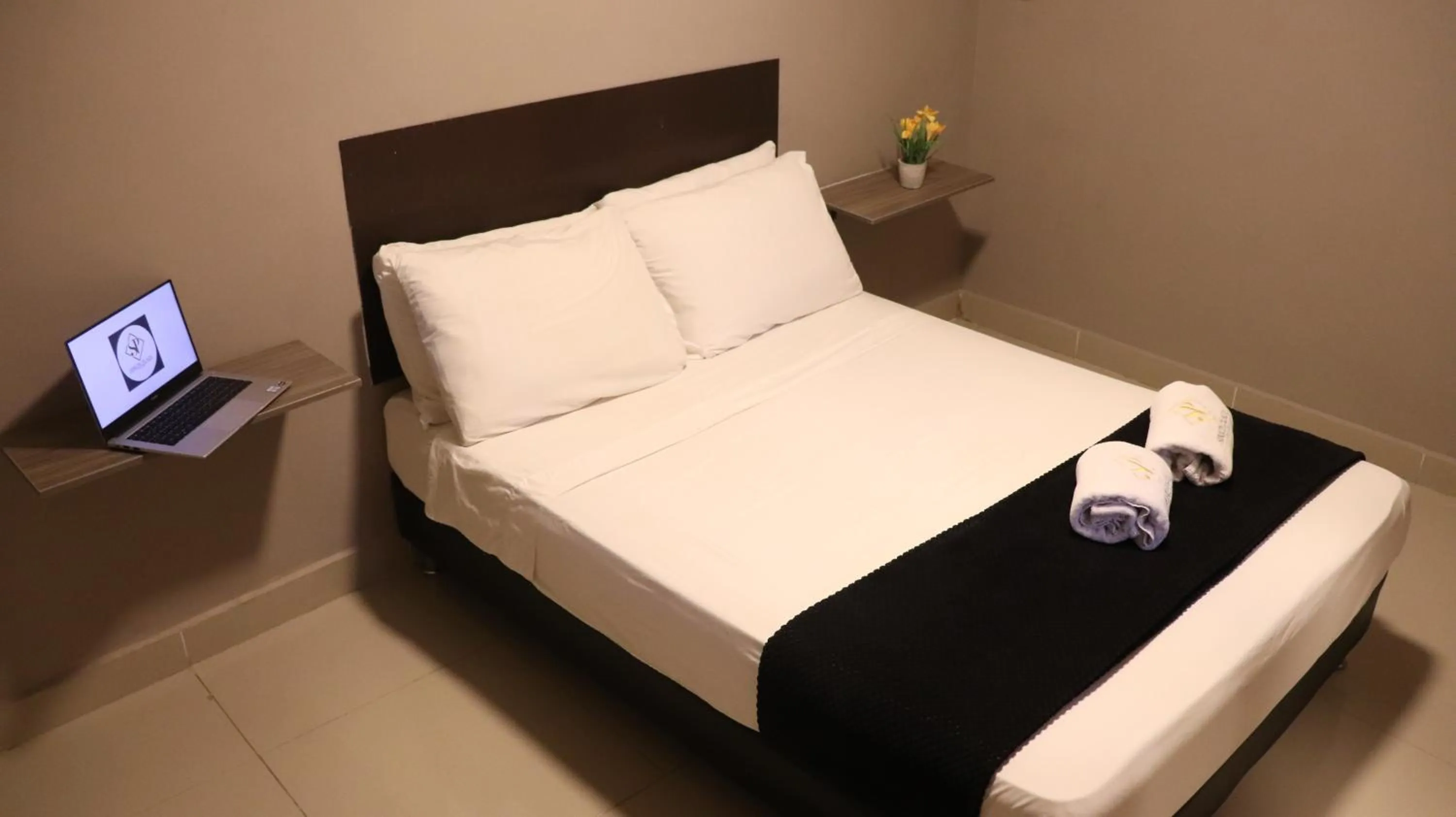 Bed in Hotel Simón Plaza