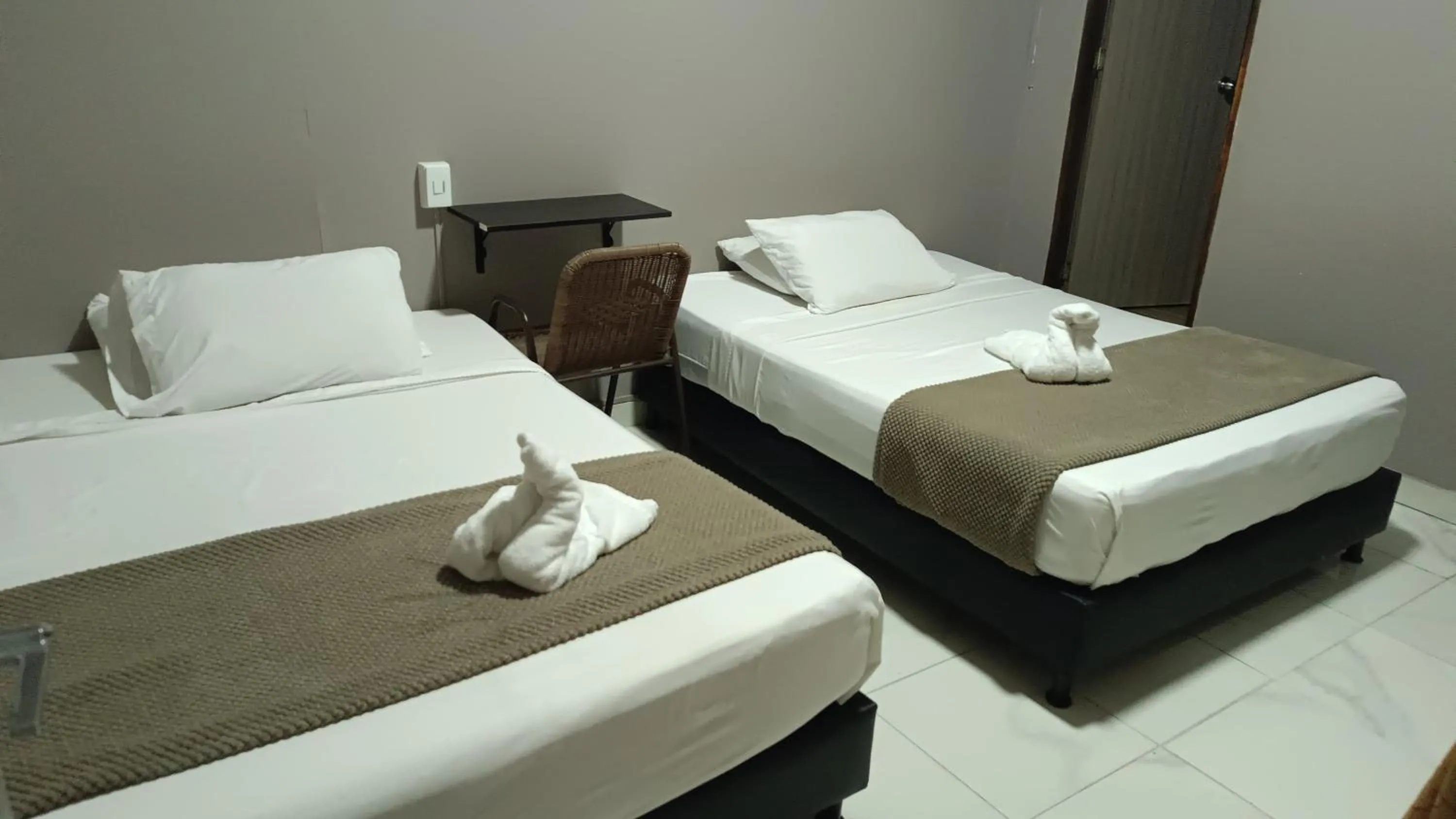 Bed in Hotel Simón Plaza