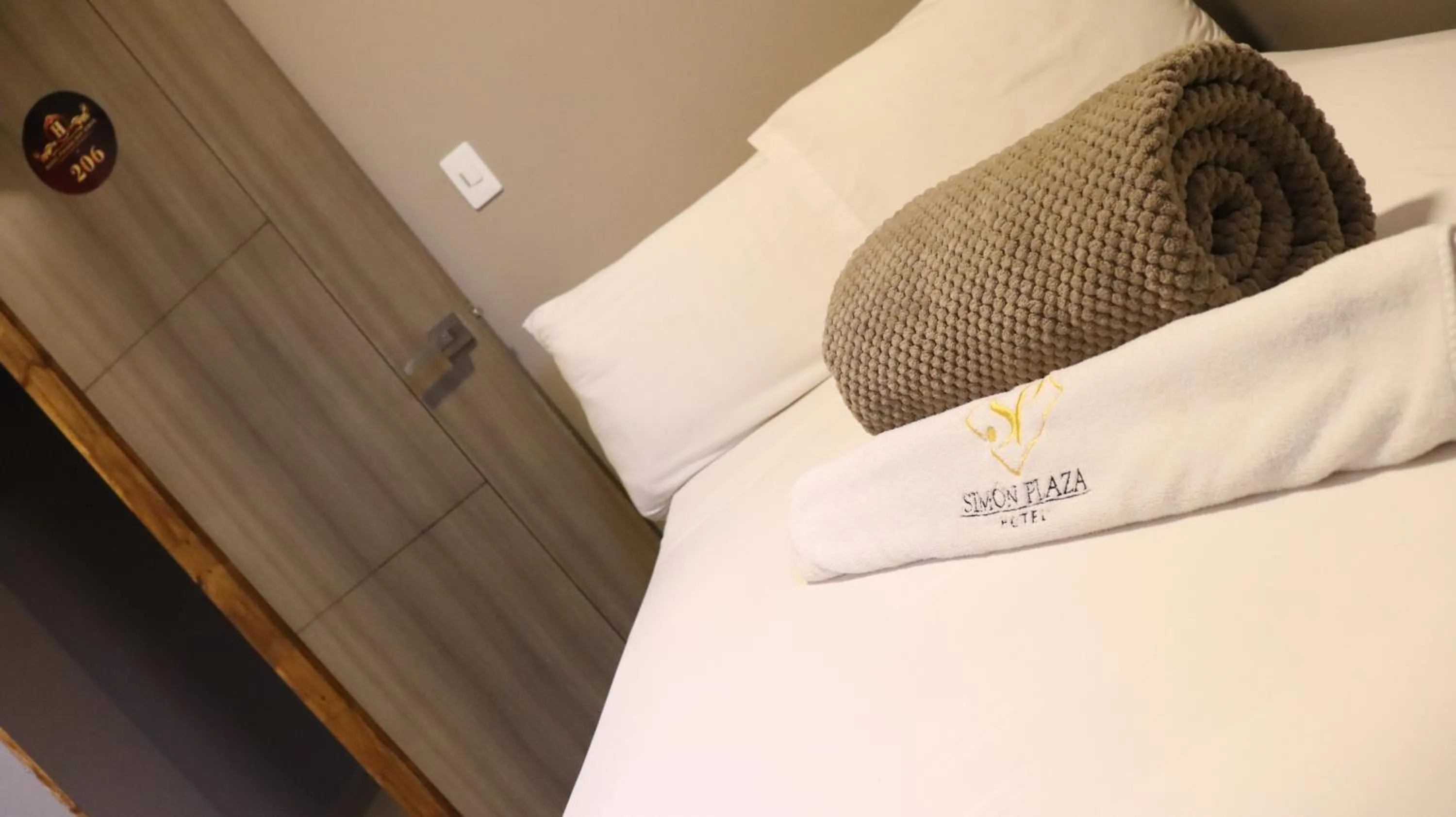 Bed in Hotel Simón Plaza