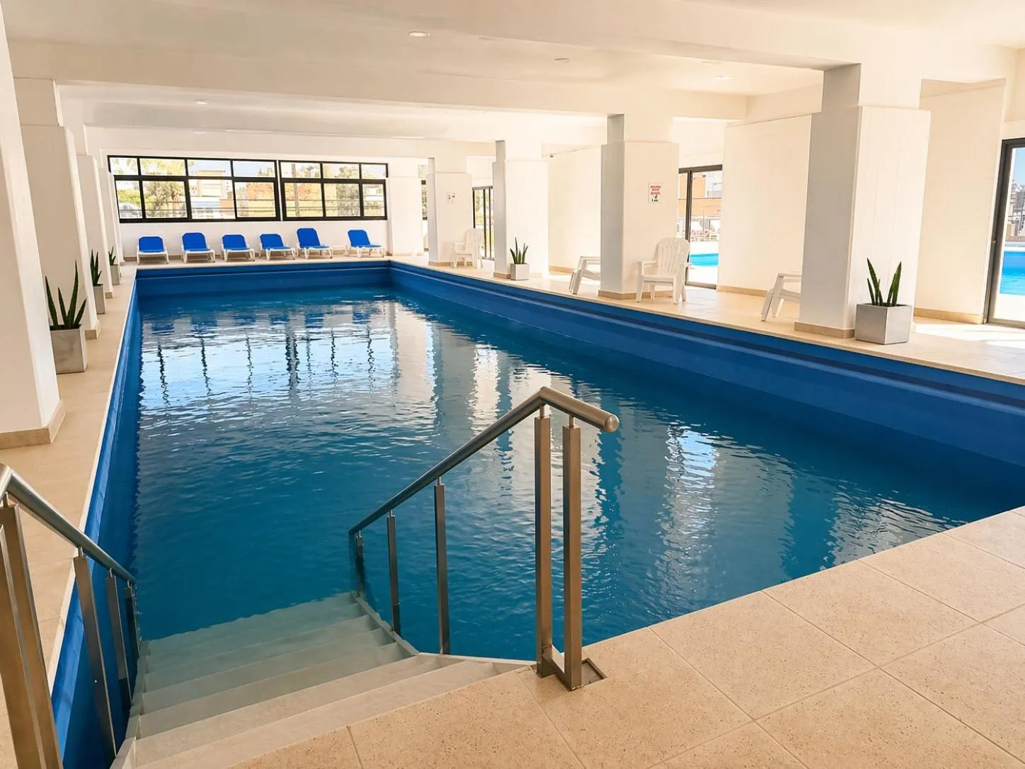 Swimming pool in Grand Hotel by MH
