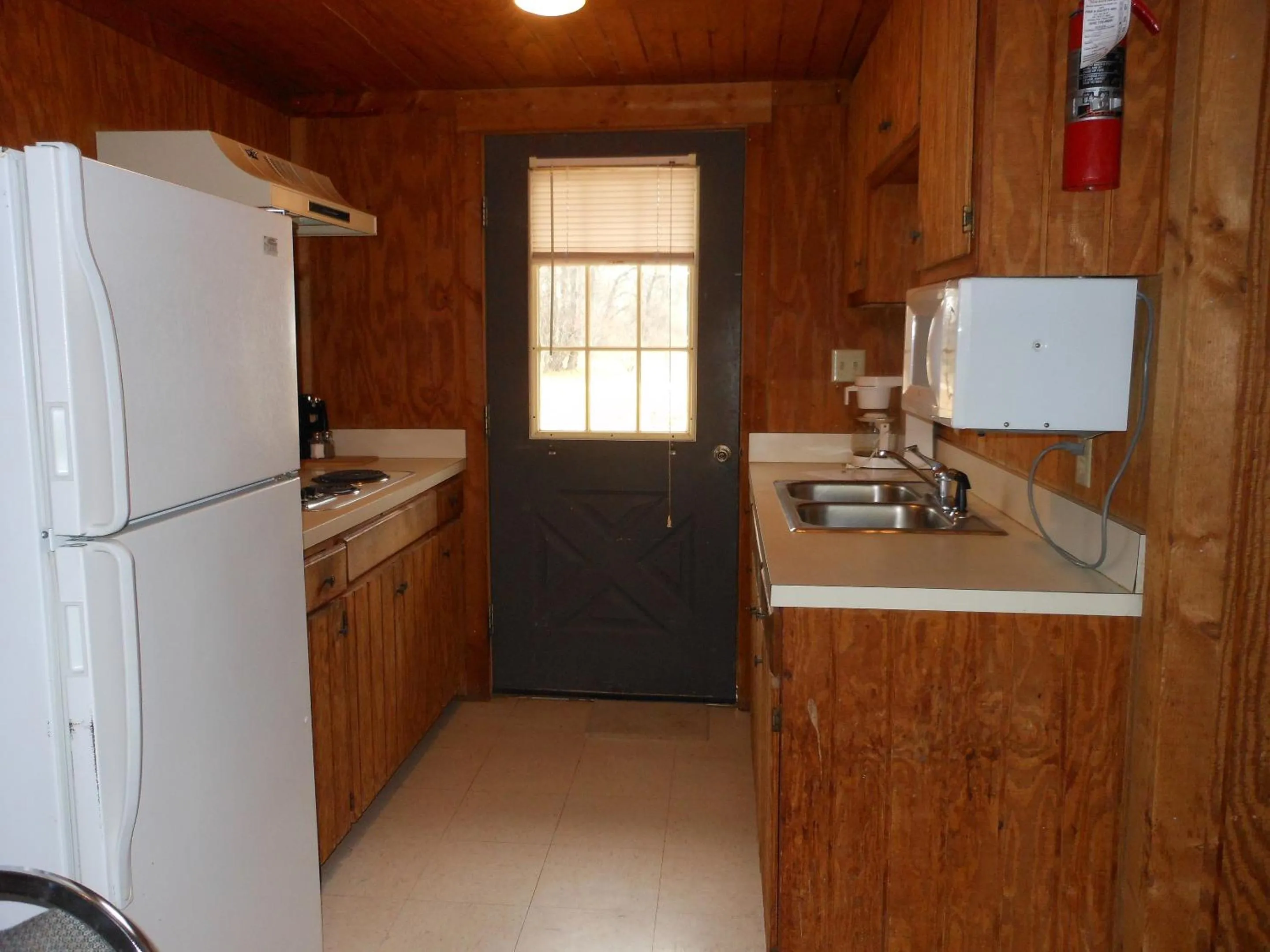 Kitchen or kitchenette in Bay Landing Camping Resort Cabin 14