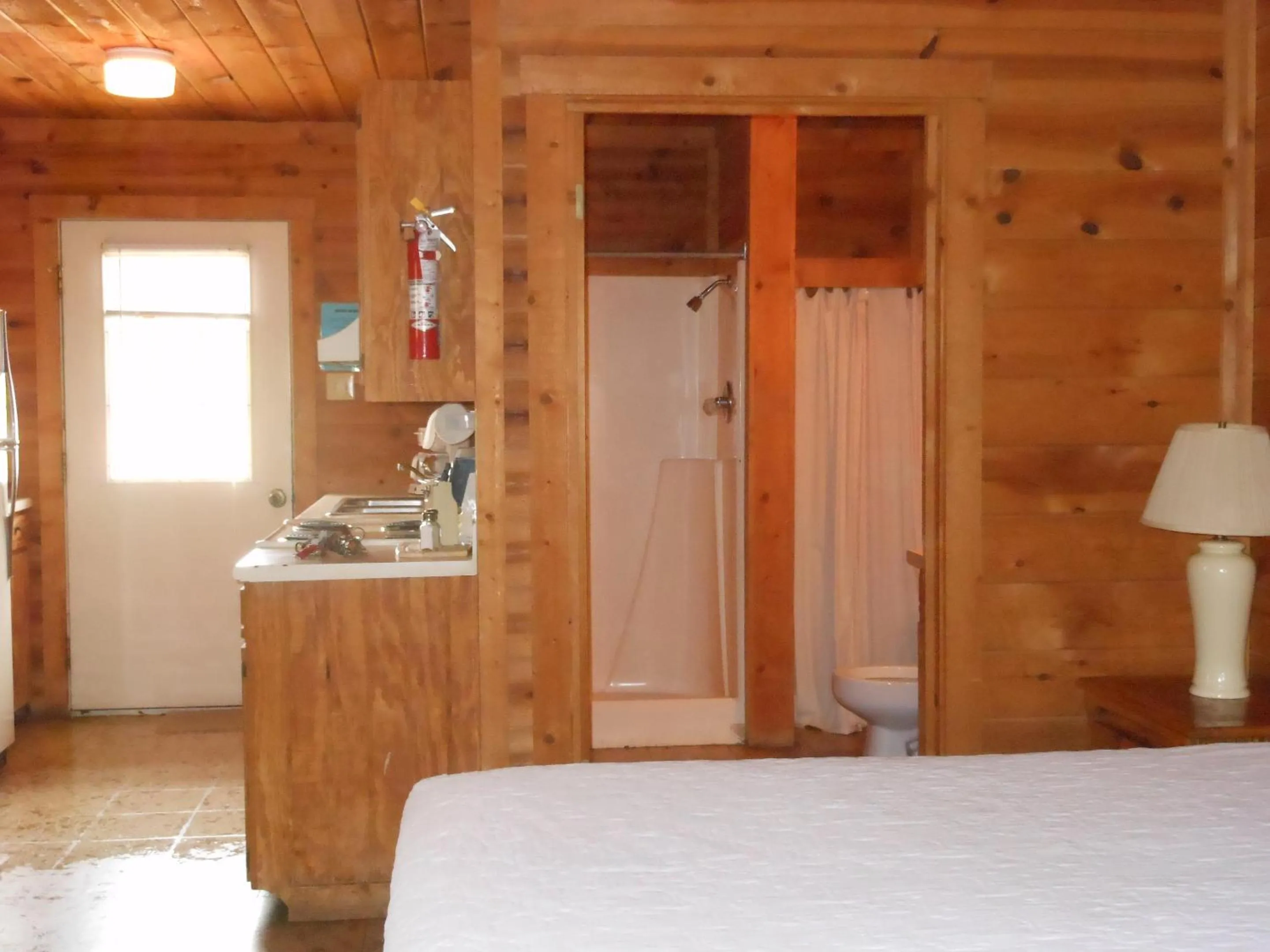 Bedroom, Bed in Bay Landing Camping Resort Deluxe Cabin 29