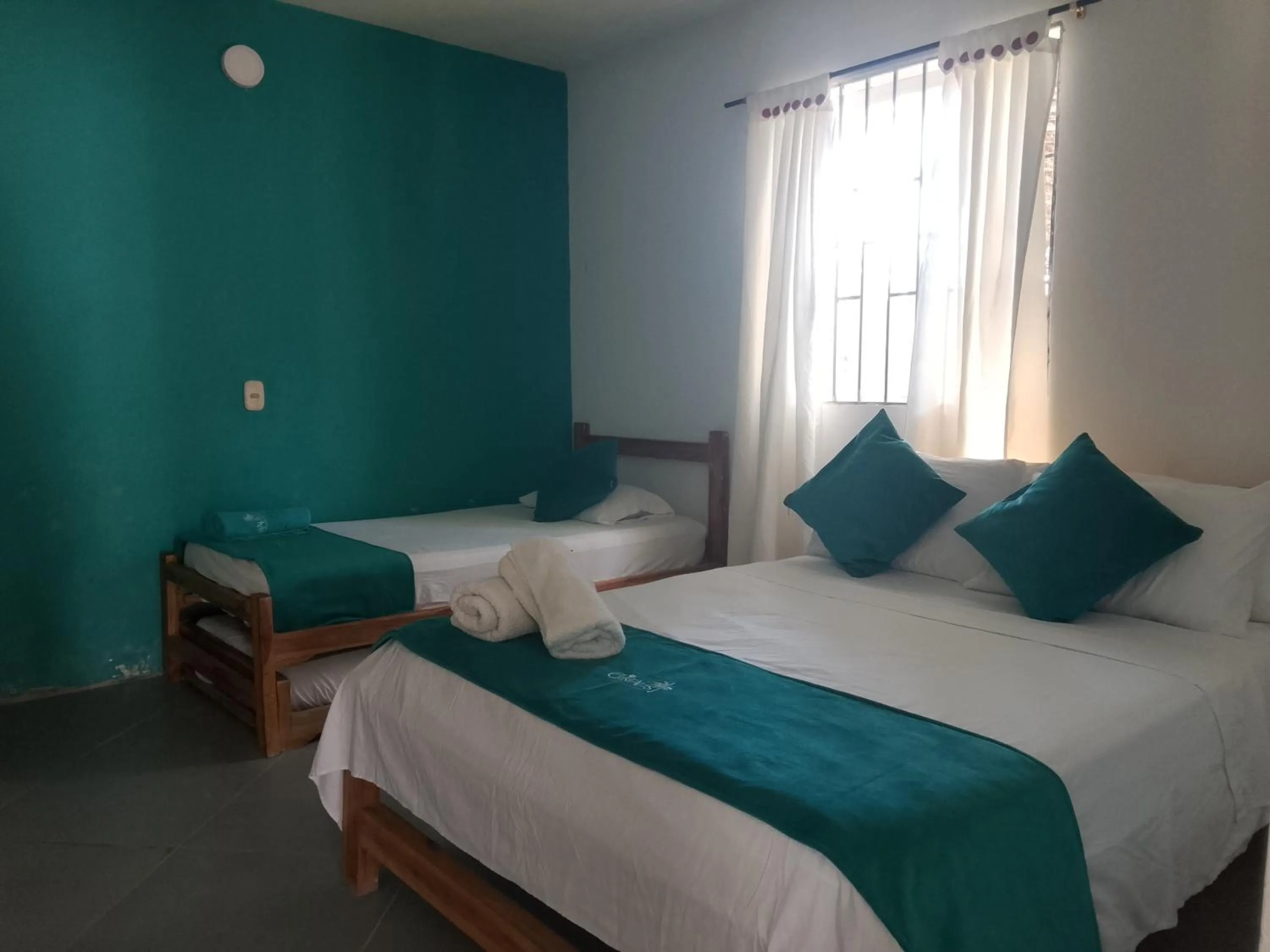 Photo of the whole room, Bed in Cabaña Los Cristales Coveñas by Amauna