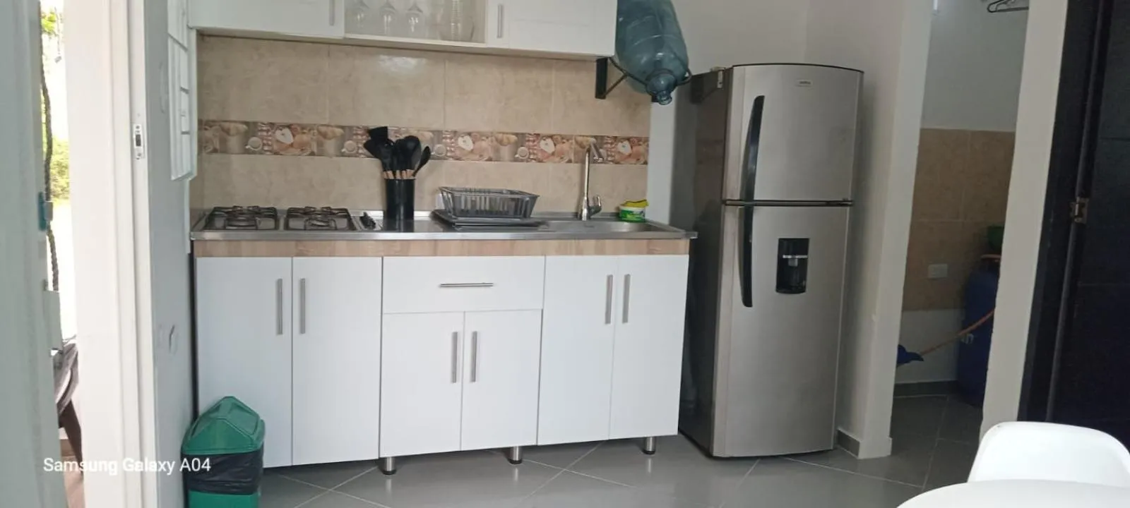 Kitchen or kitchenette in Cabaña Los Cristales Coveñas by Amauna