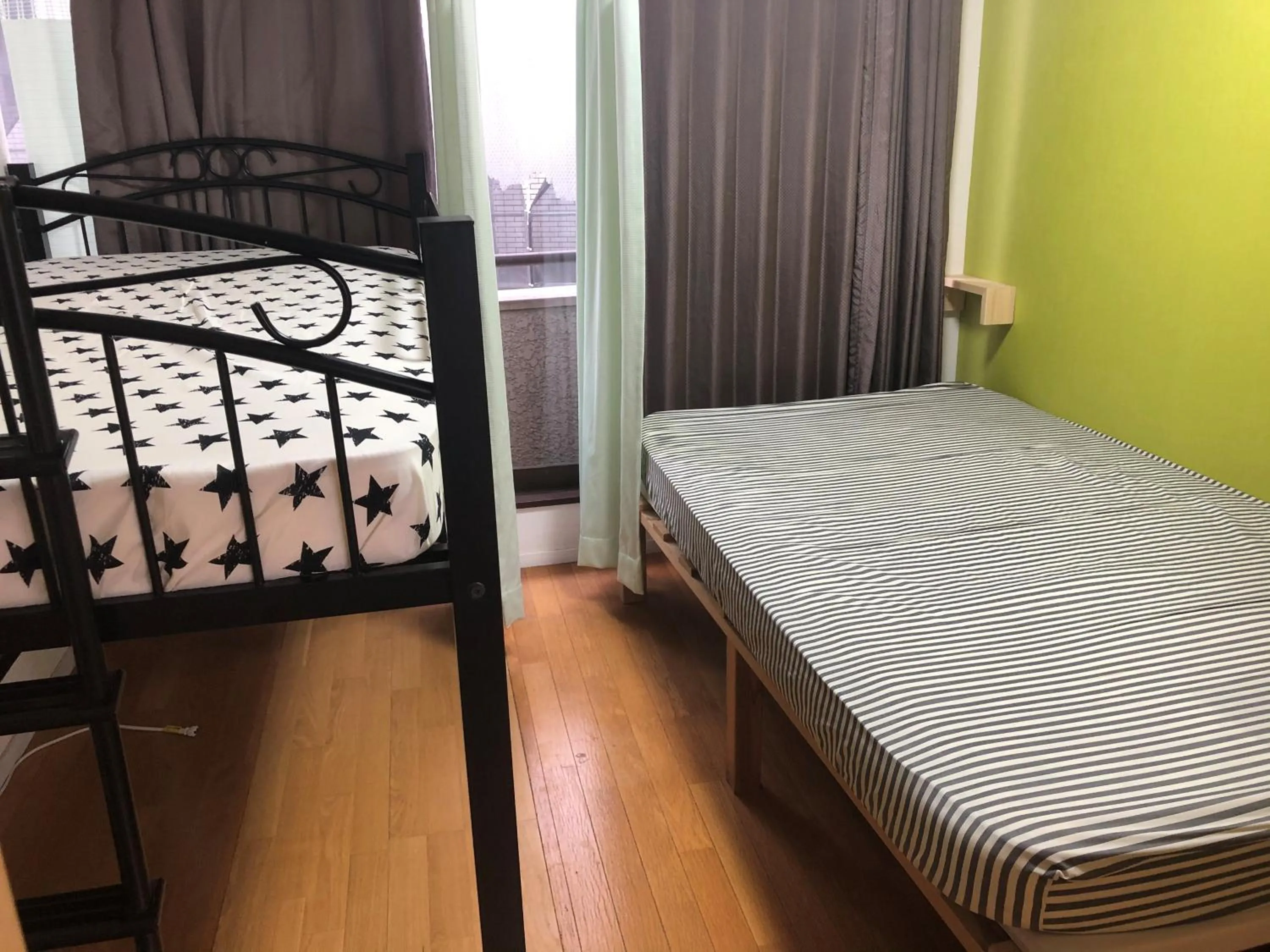 Bed in Yasuragi Nakasu