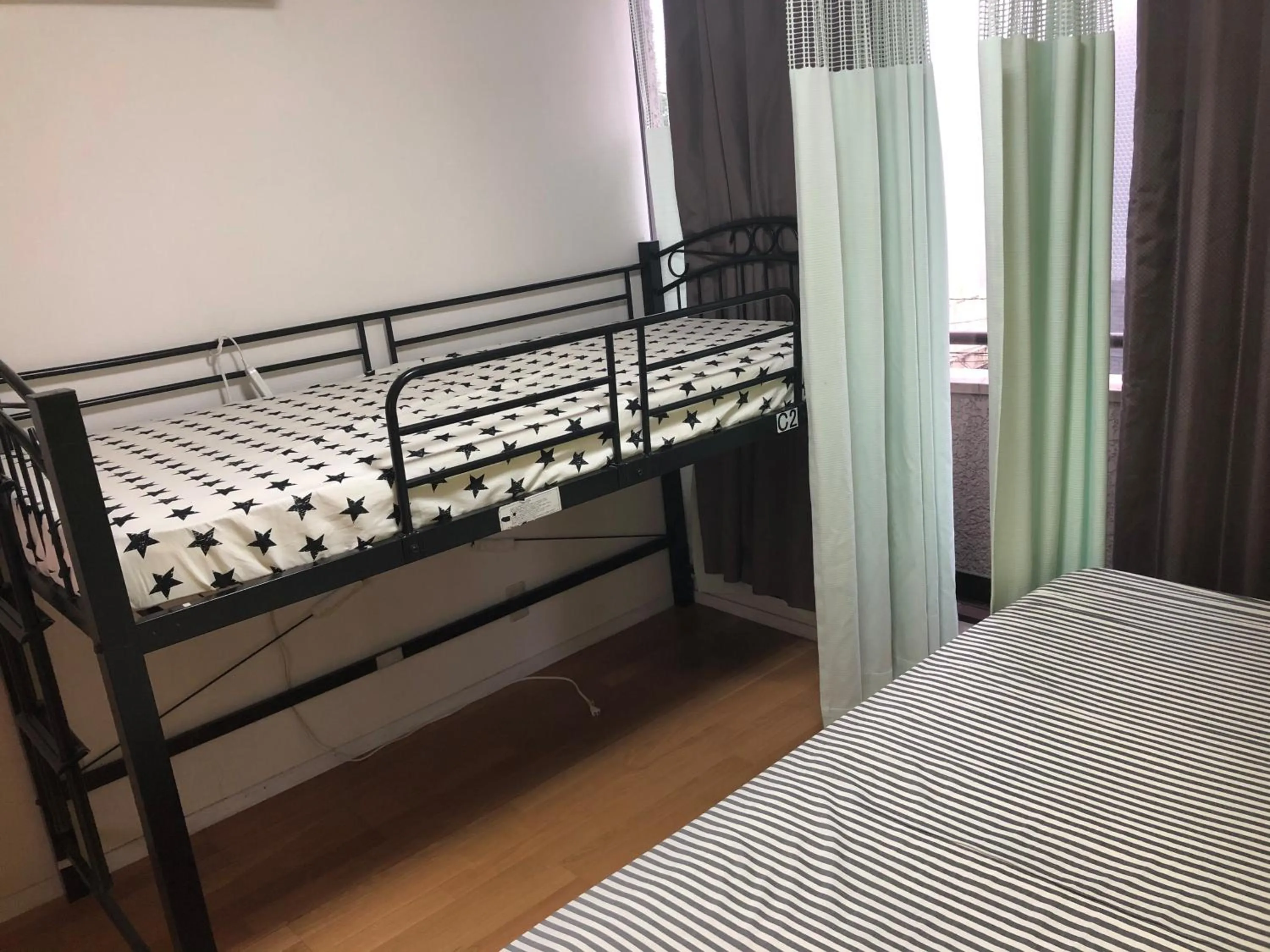 Bed in Yasuragi Nakasu