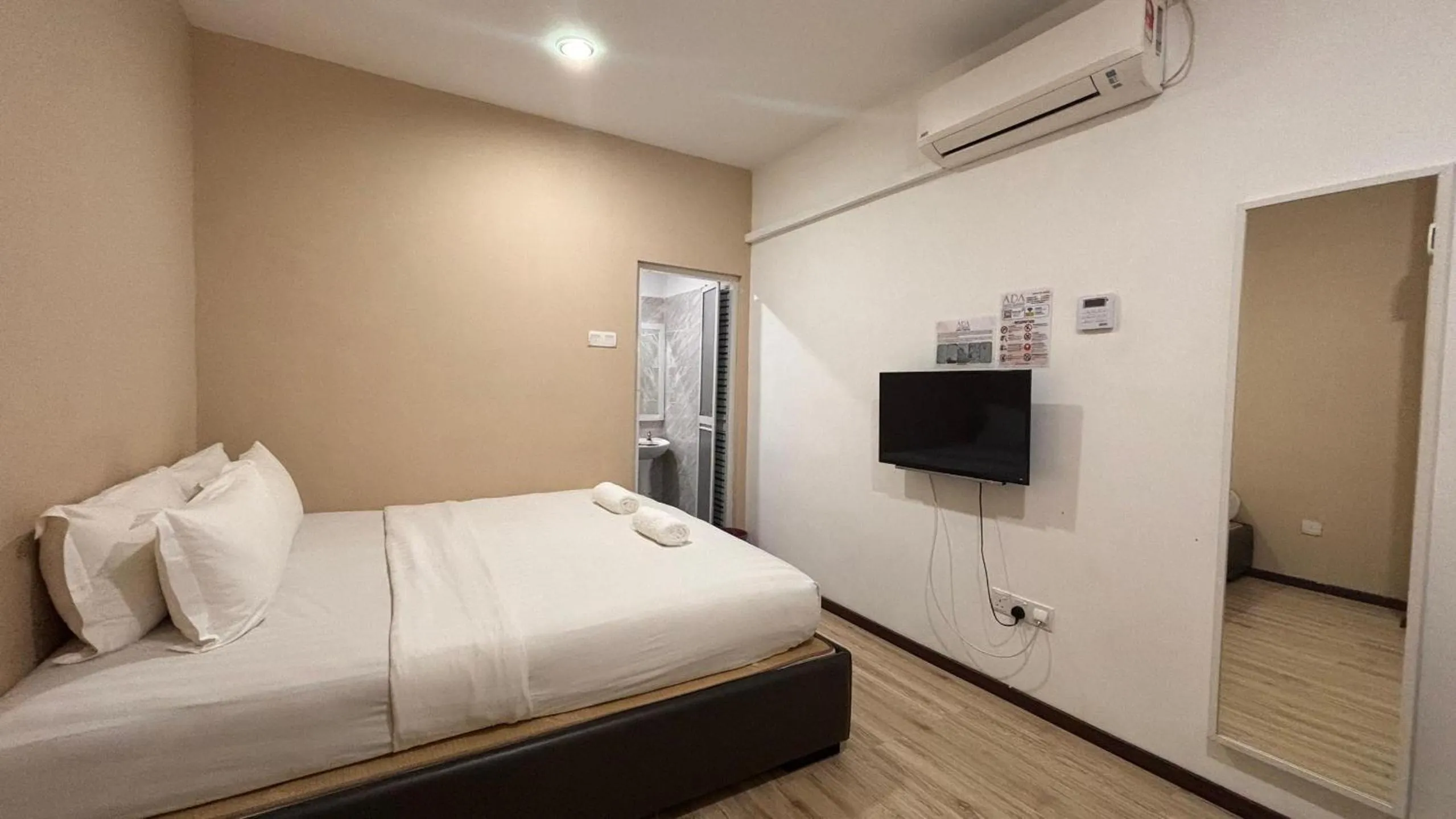 Bed in Ada Hotel & Apartment