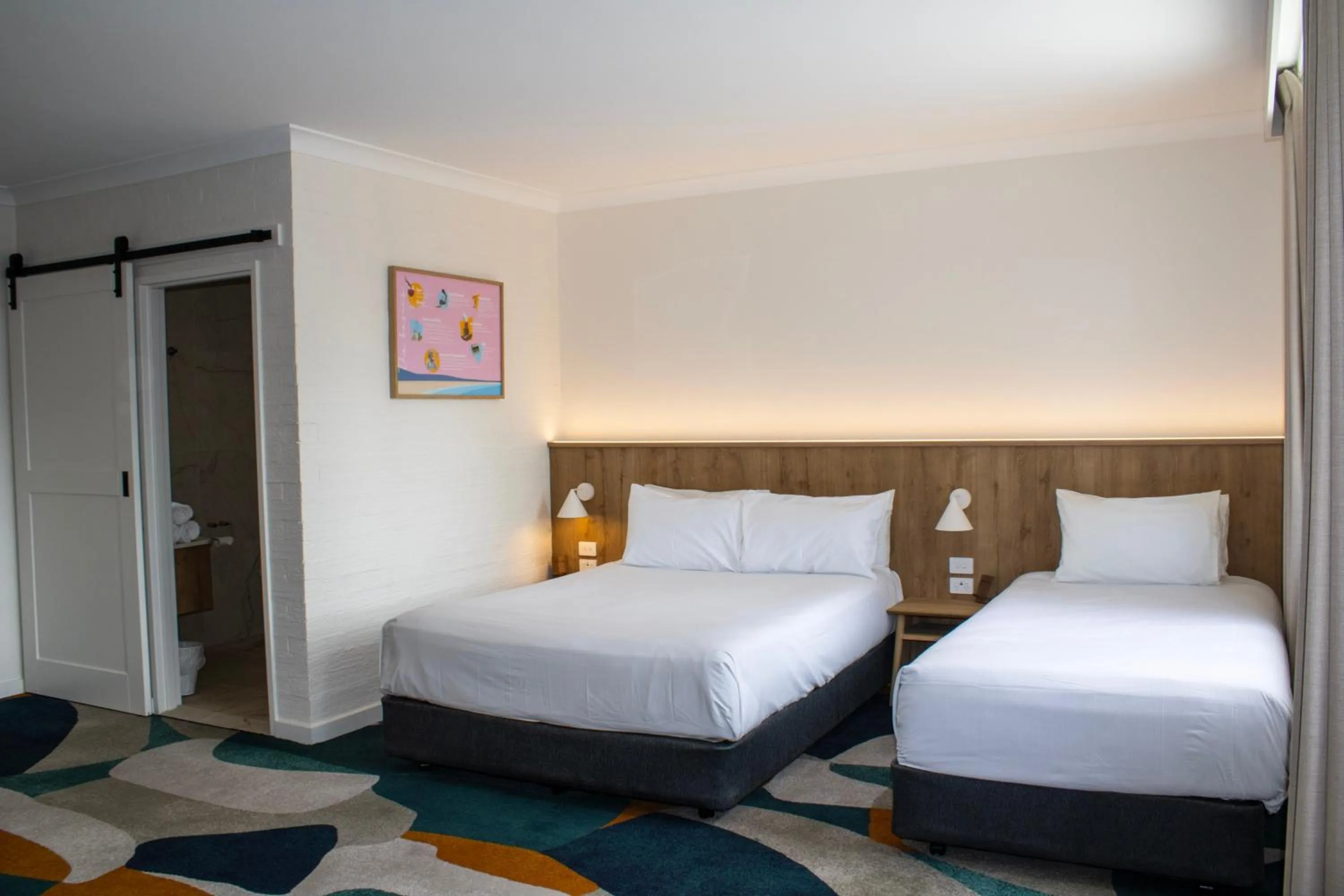 Bed in Seabreeze Beach Hotel